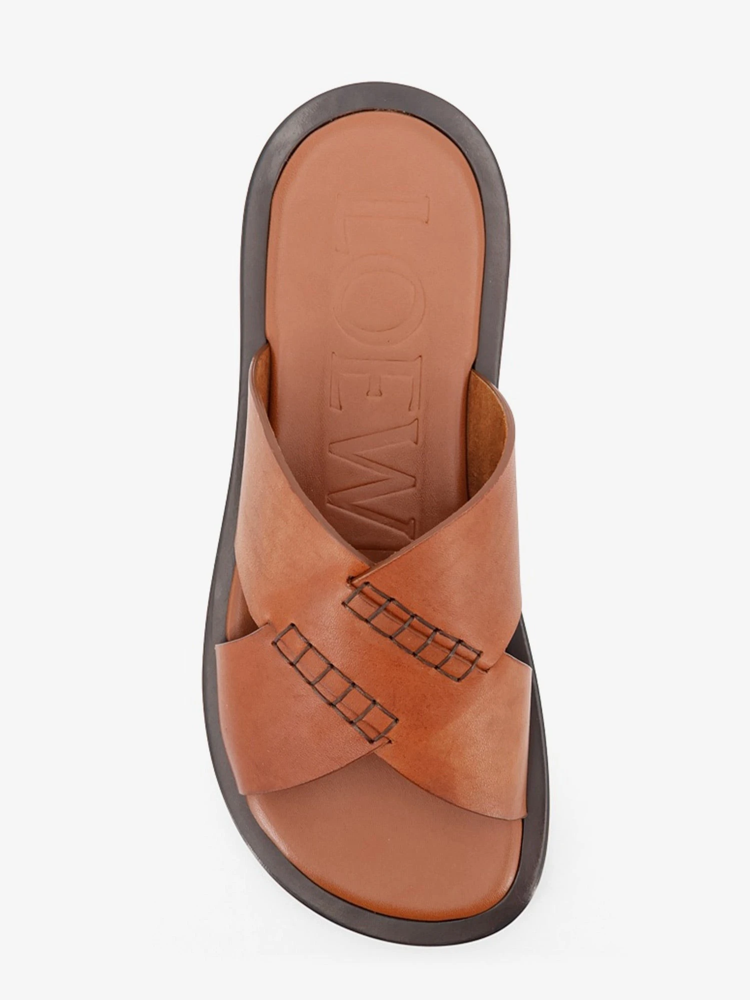 Flex leather sandals with crisscross detail.webp