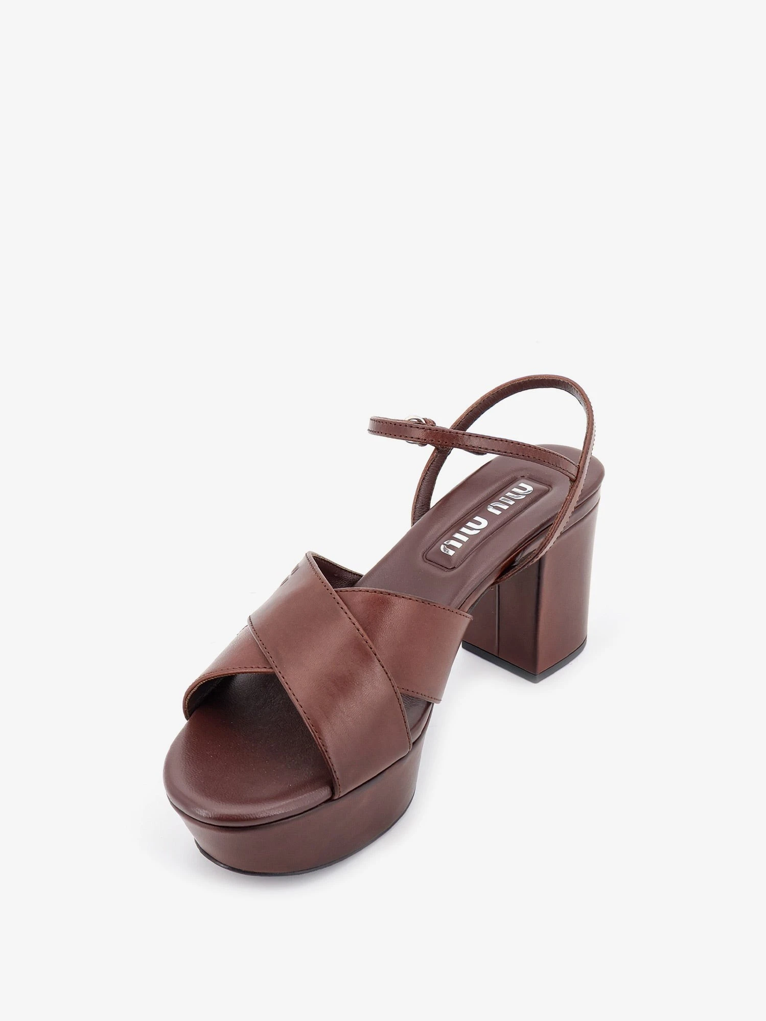 Leather heeled sandals with engraved logo on the side.webp