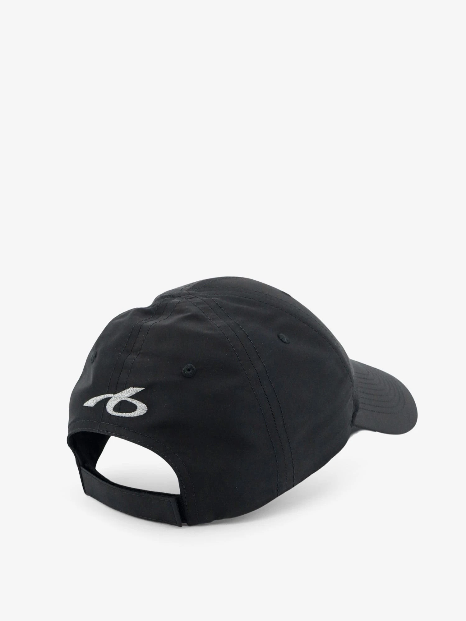Techwear technical fabric hat with embroidered lettering logo.webp
