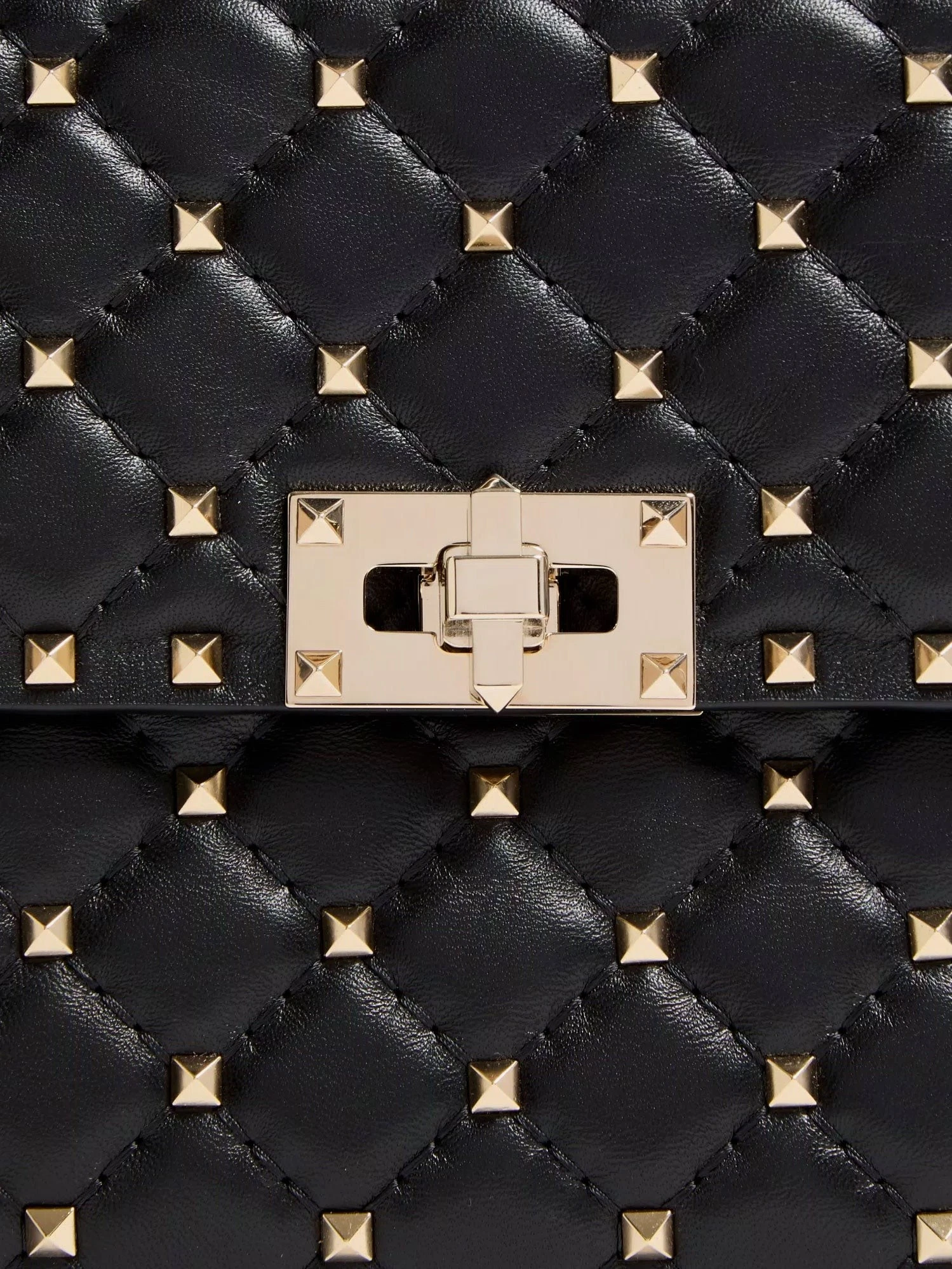Rockstud Spike leather crossbody bag with iconic all-over studs.webp