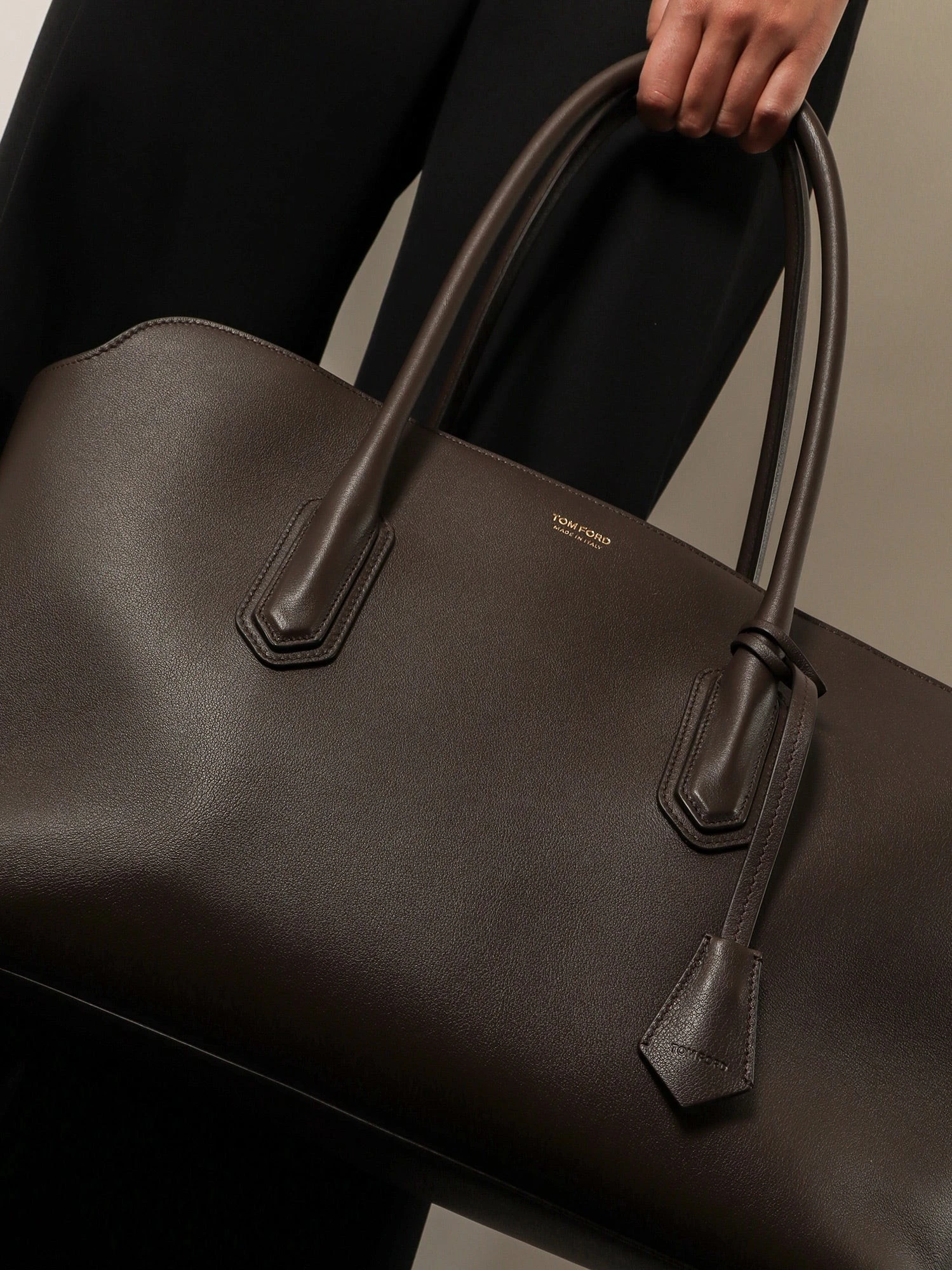 Leather shoulder bag with logo.webp