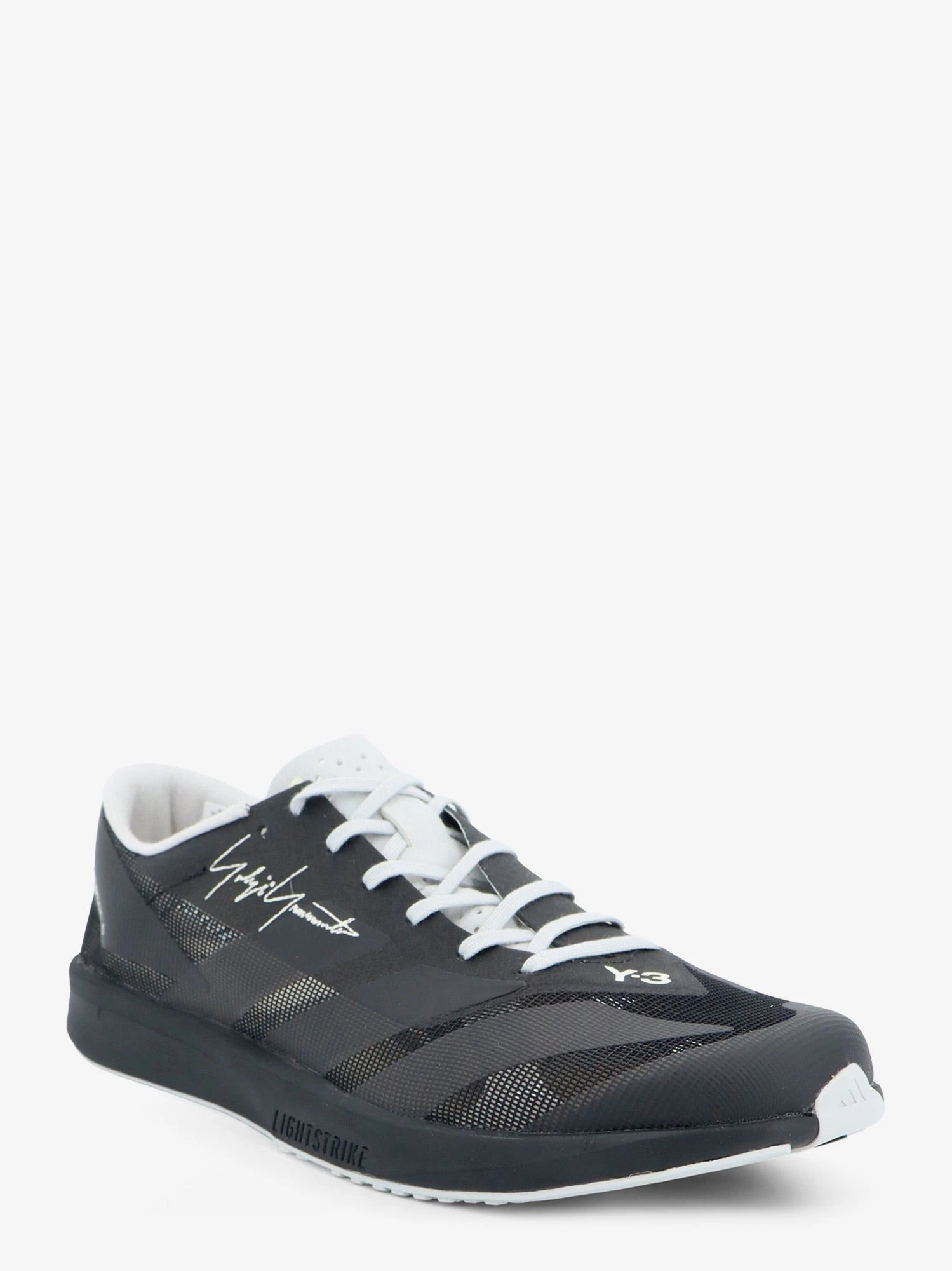 Mesh sneakers with embroidered logo on the side.webp