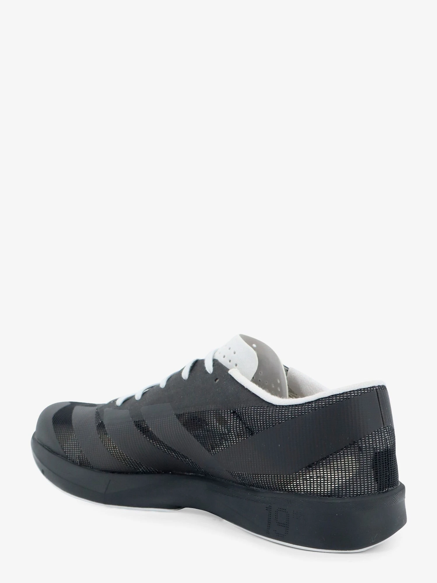 Mesh sneakers with embroidered logo on the side.webp