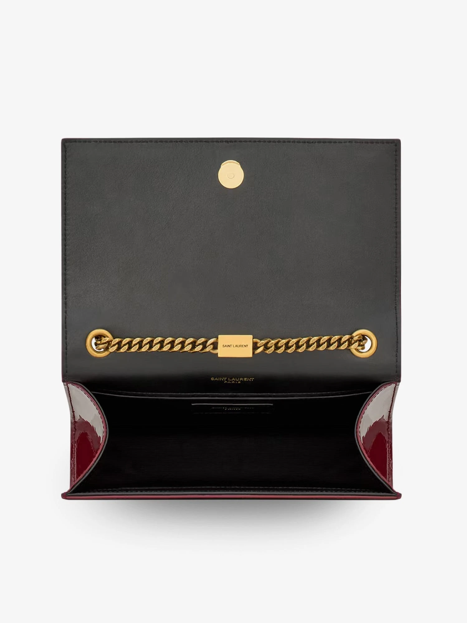 Kate patent leather crossbody bag.webp