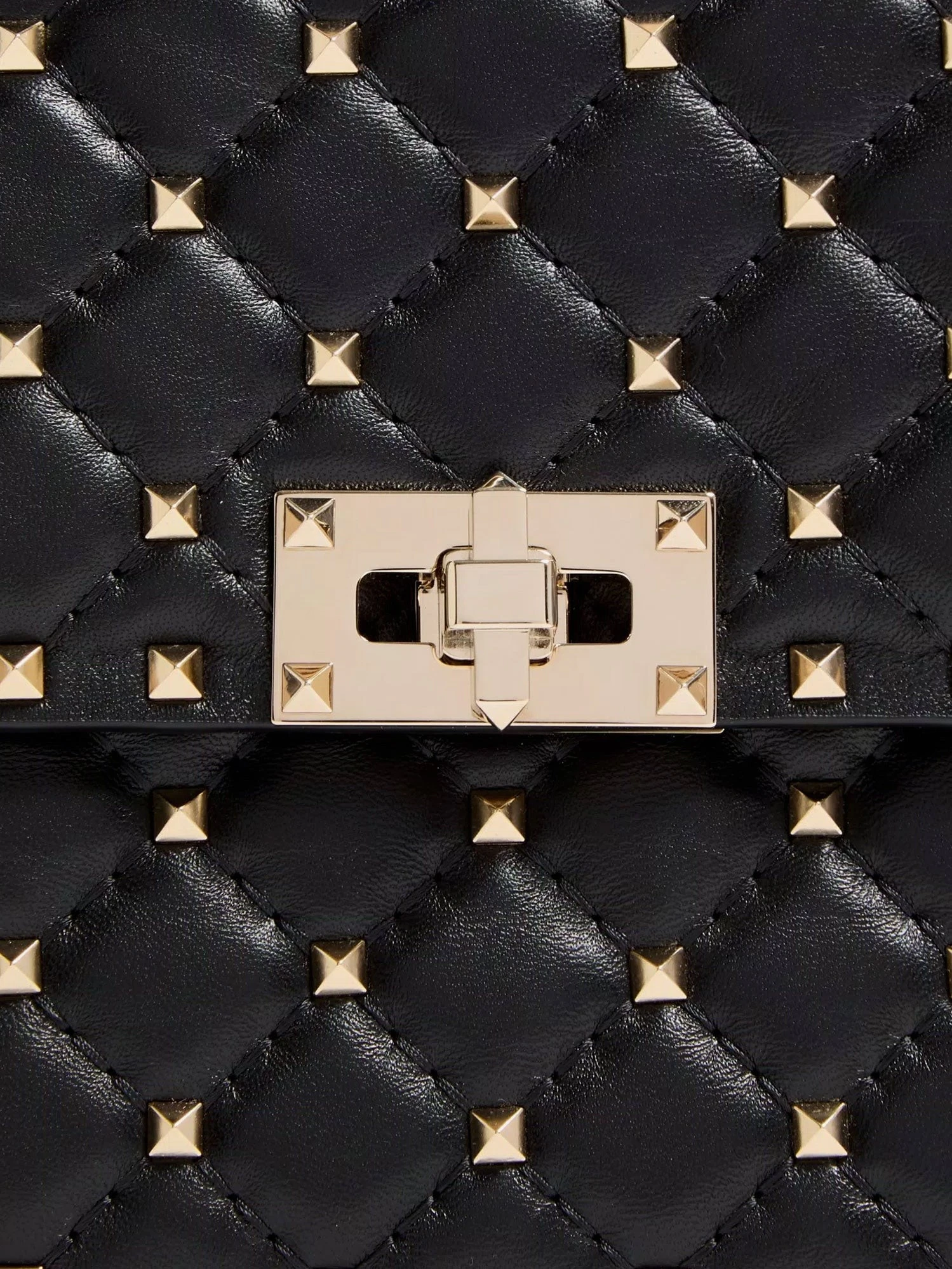 Rockstud Spike leather crossbody bag with iconic all-over studs.webp