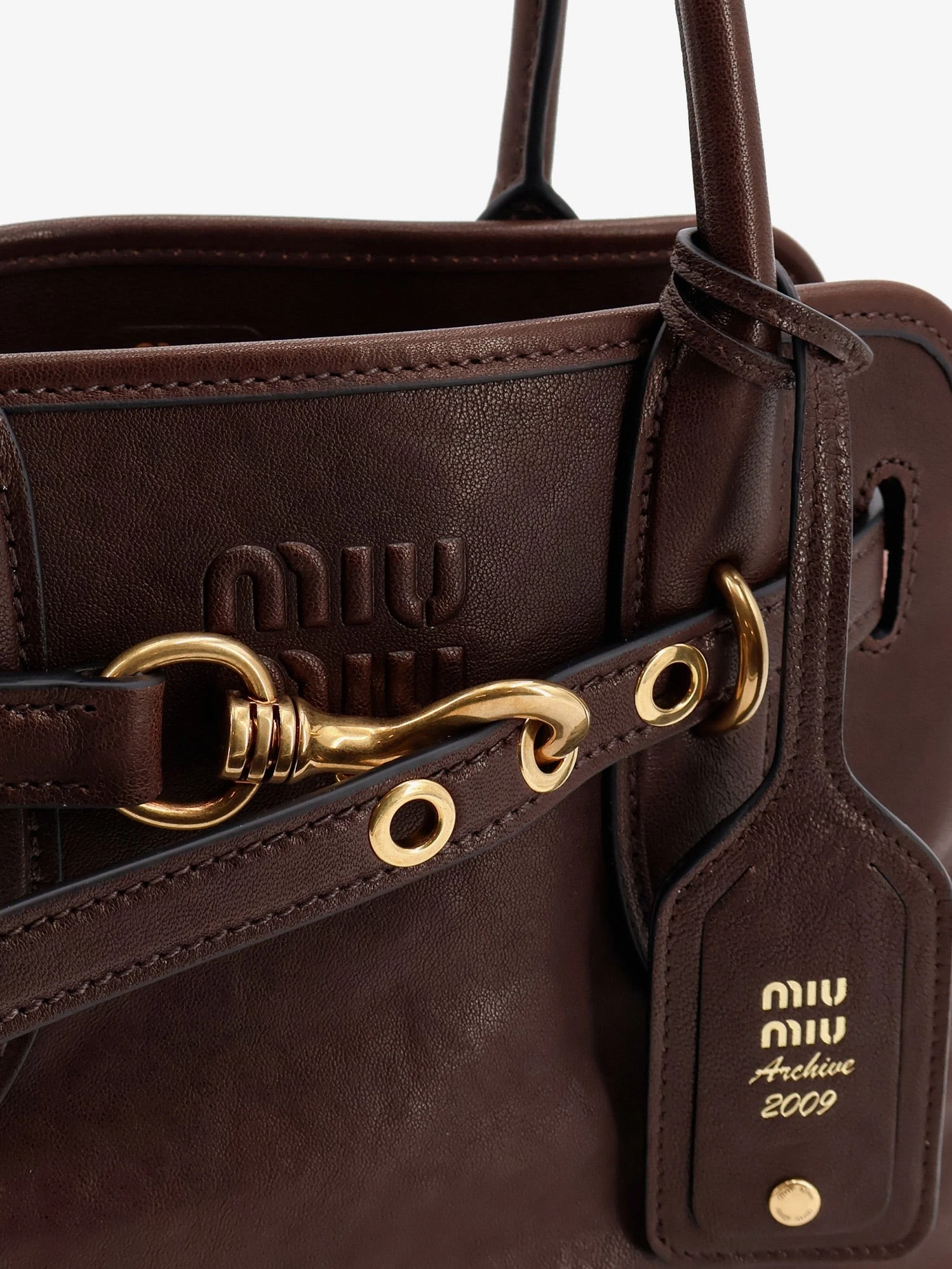 Aventure leather handbag with embossed lettering logo.webp