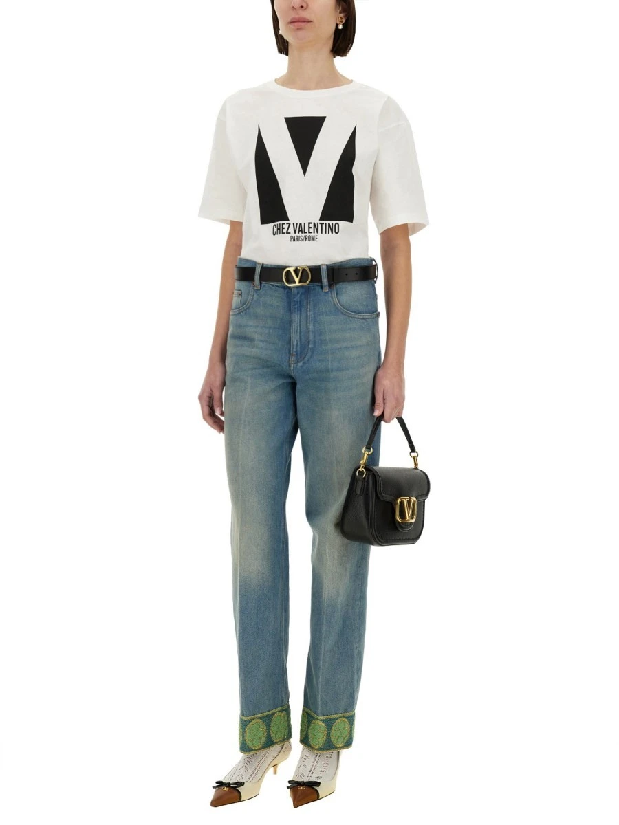 DENIM PANTS WITH JACQUARD EDGES.webp