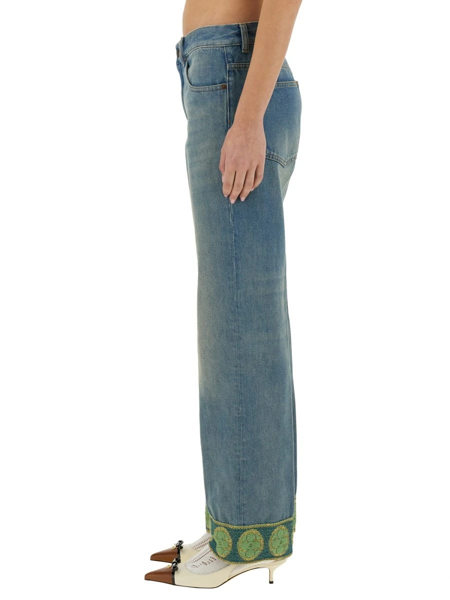 DENIM PANTS WITH JACQUARD EDGES.webp