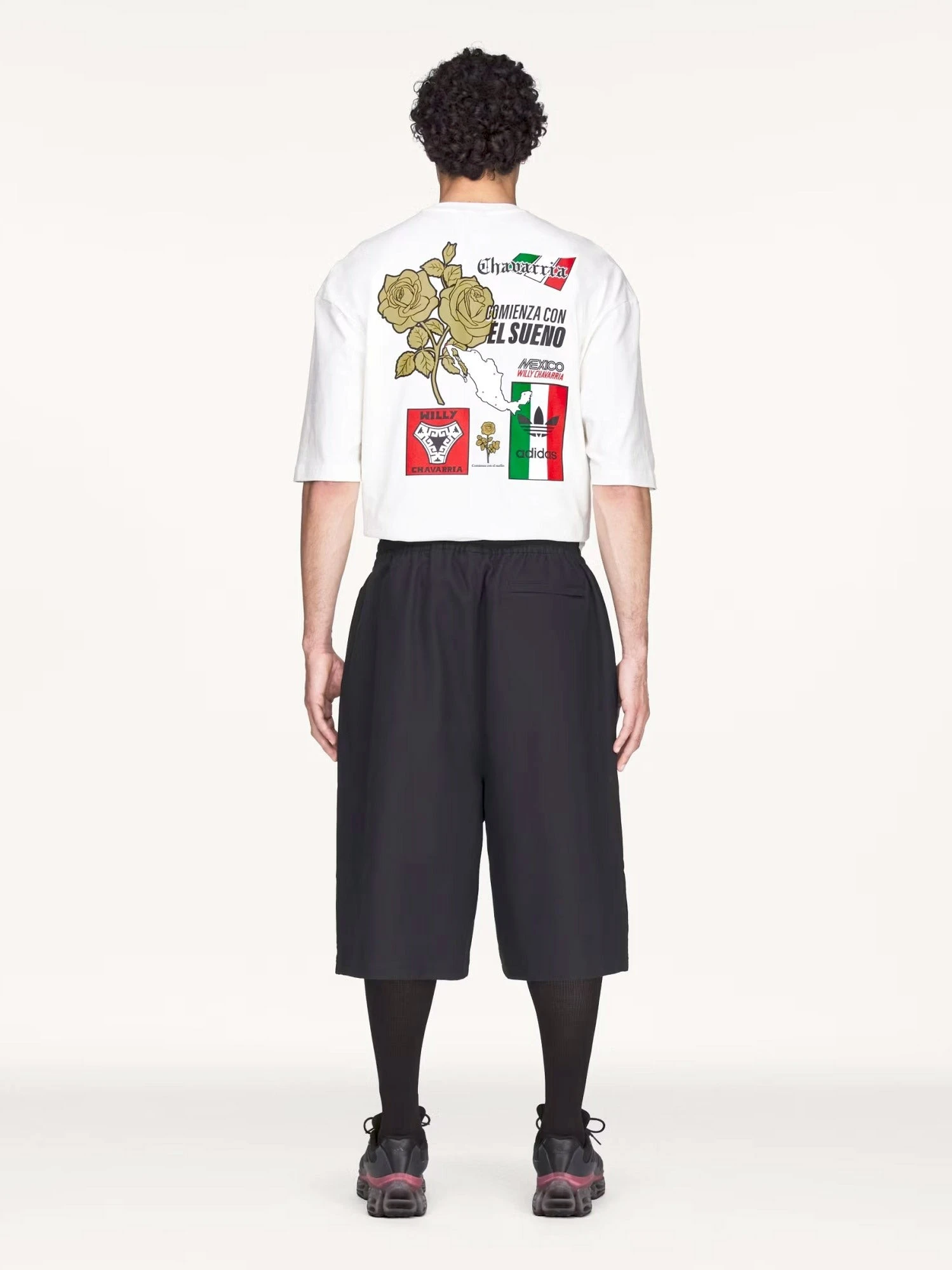 Oversized cotton Bermuda shorts with logo embroidery.webp