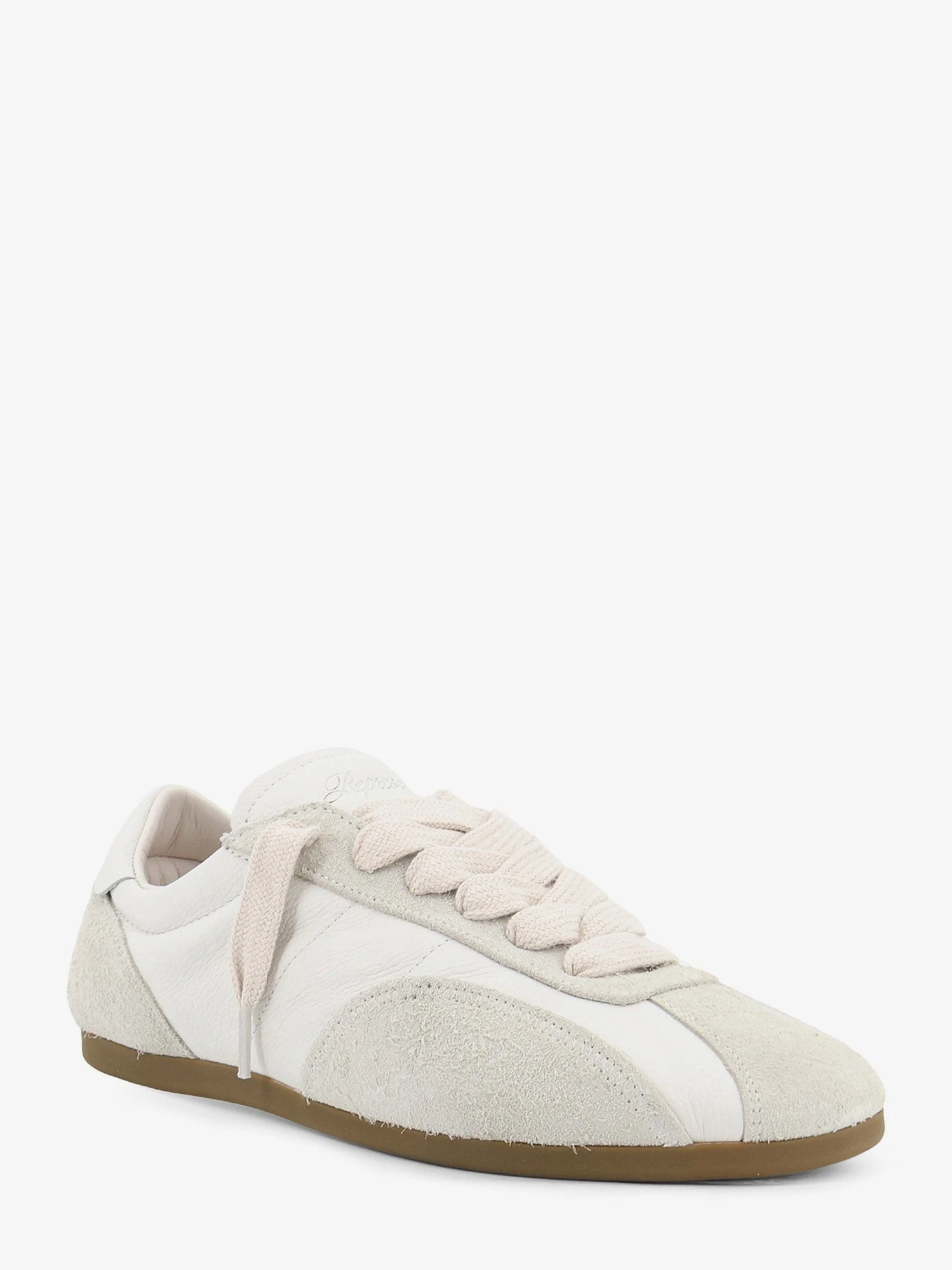 Leather and suede sneakers with engraved logo on the tongue.webp