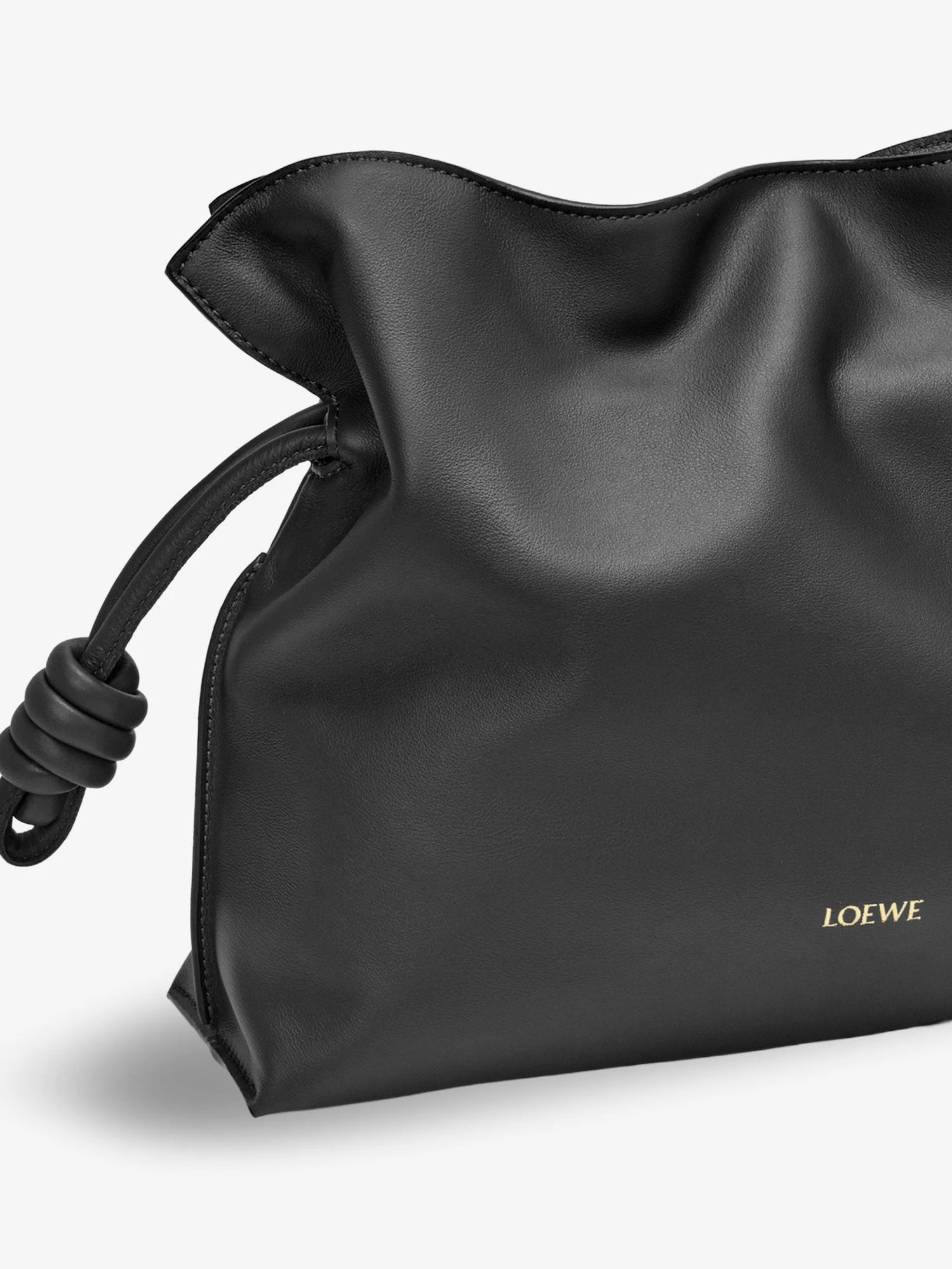 Flamenco leather clutch bag.webp