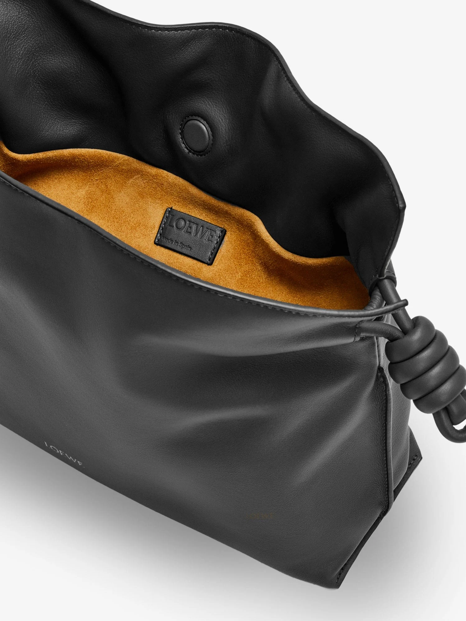 Flamenco leather clutch bag.webp
