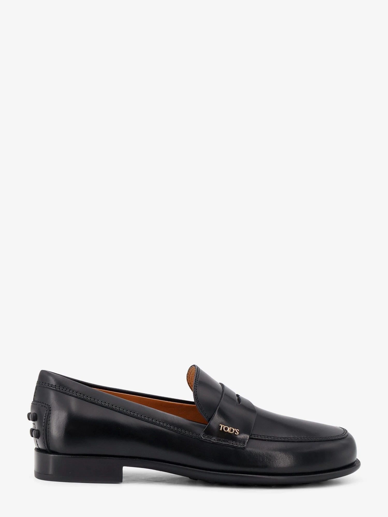 Leather loafers with Gommini detail on the back.webp