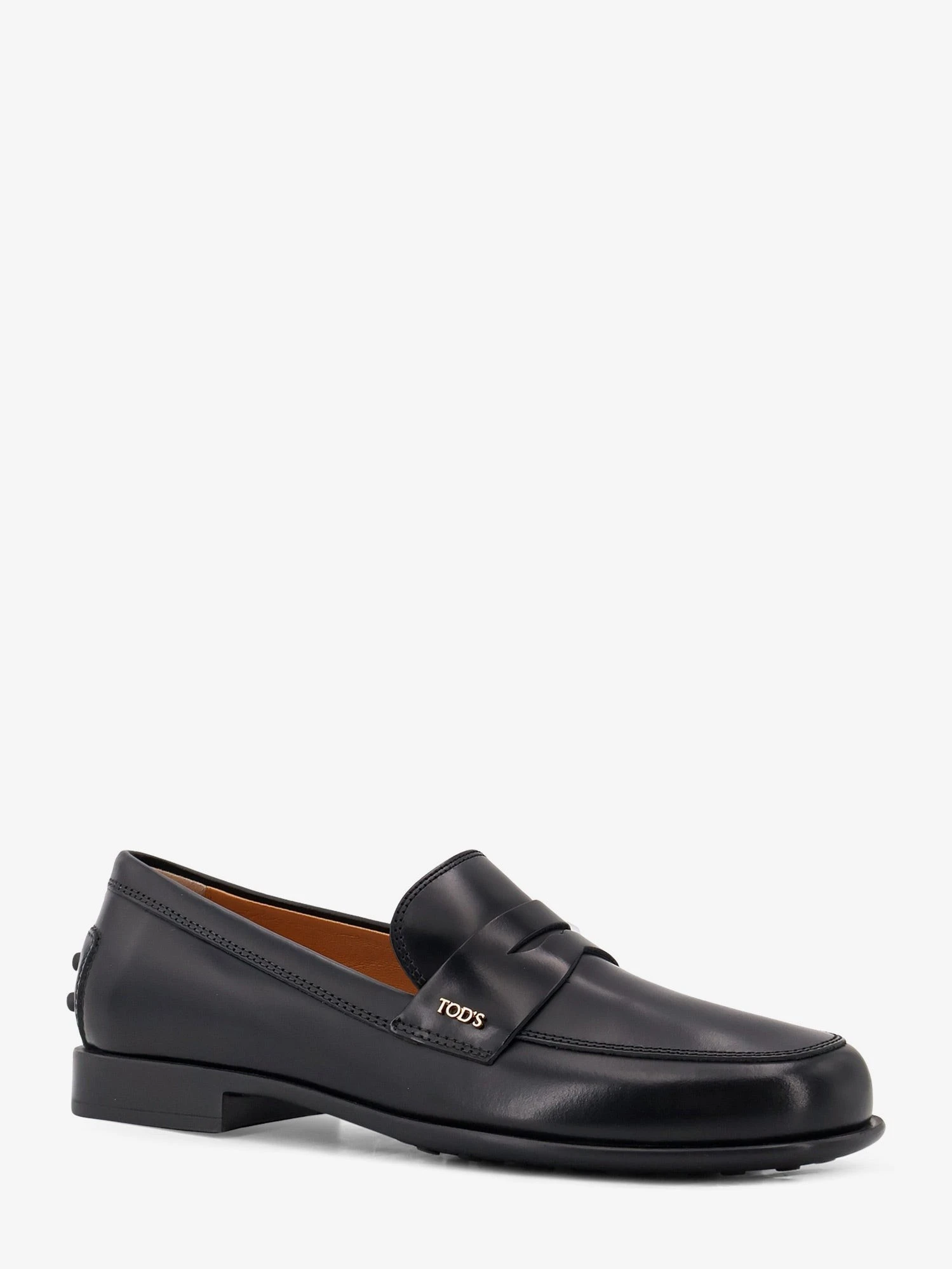 Leather loafers with Gommini detail on the back.webp