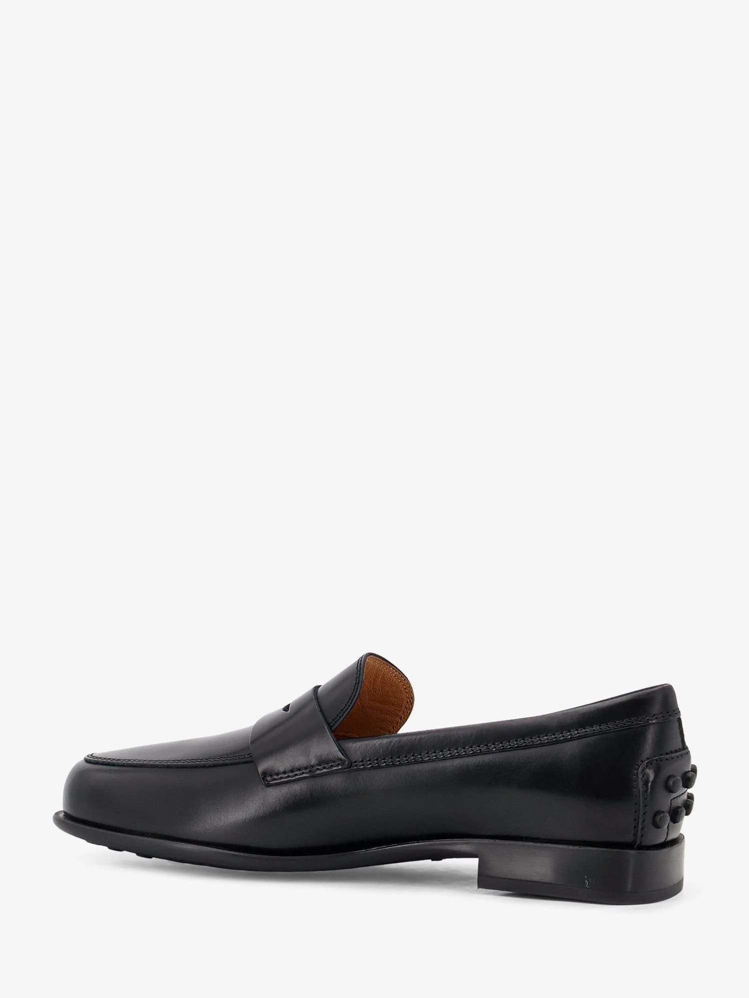 Leather loafers with Gommini detail on the back.webp