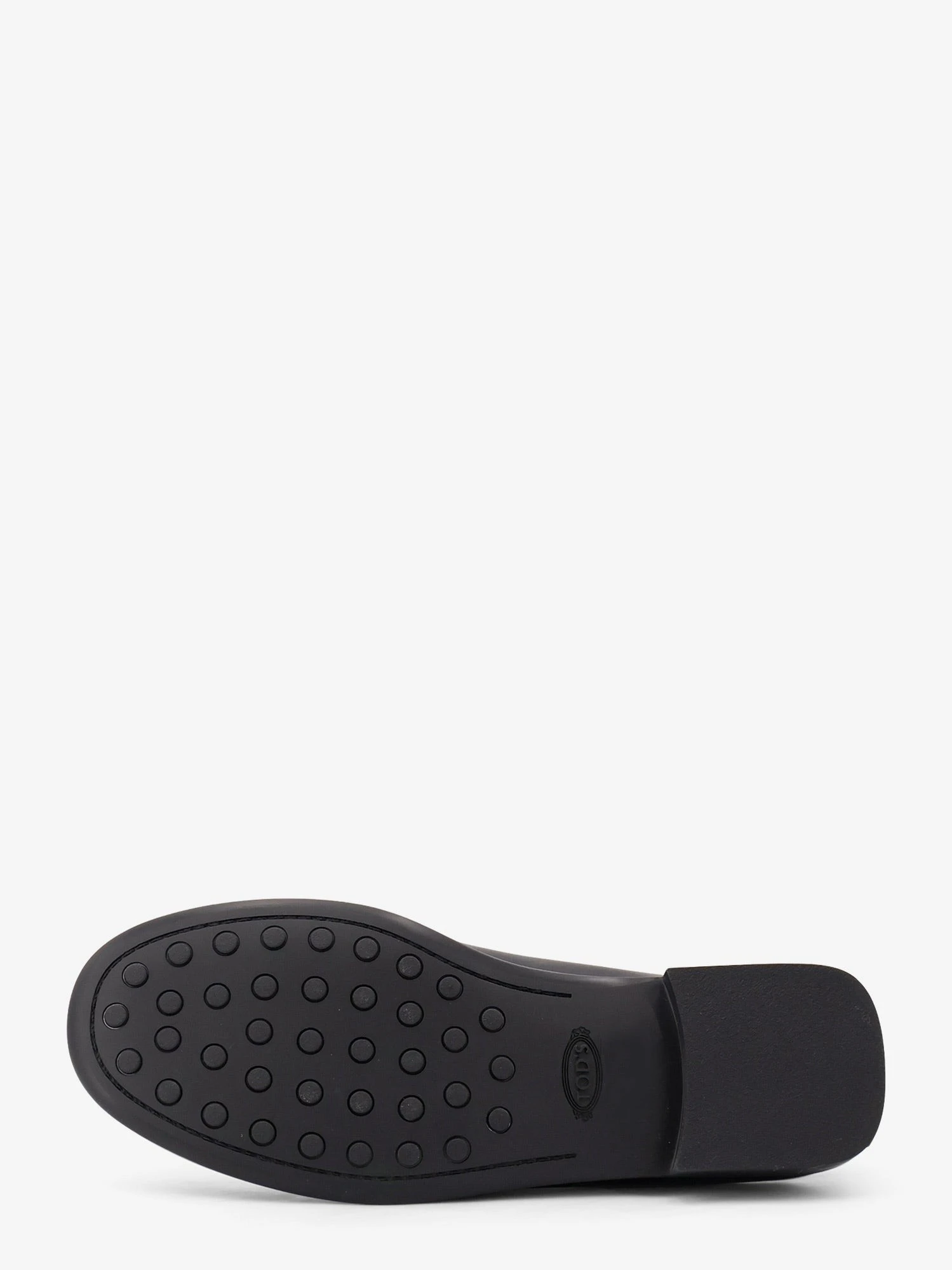 Leather loafers with Gommini detail on the back.webp