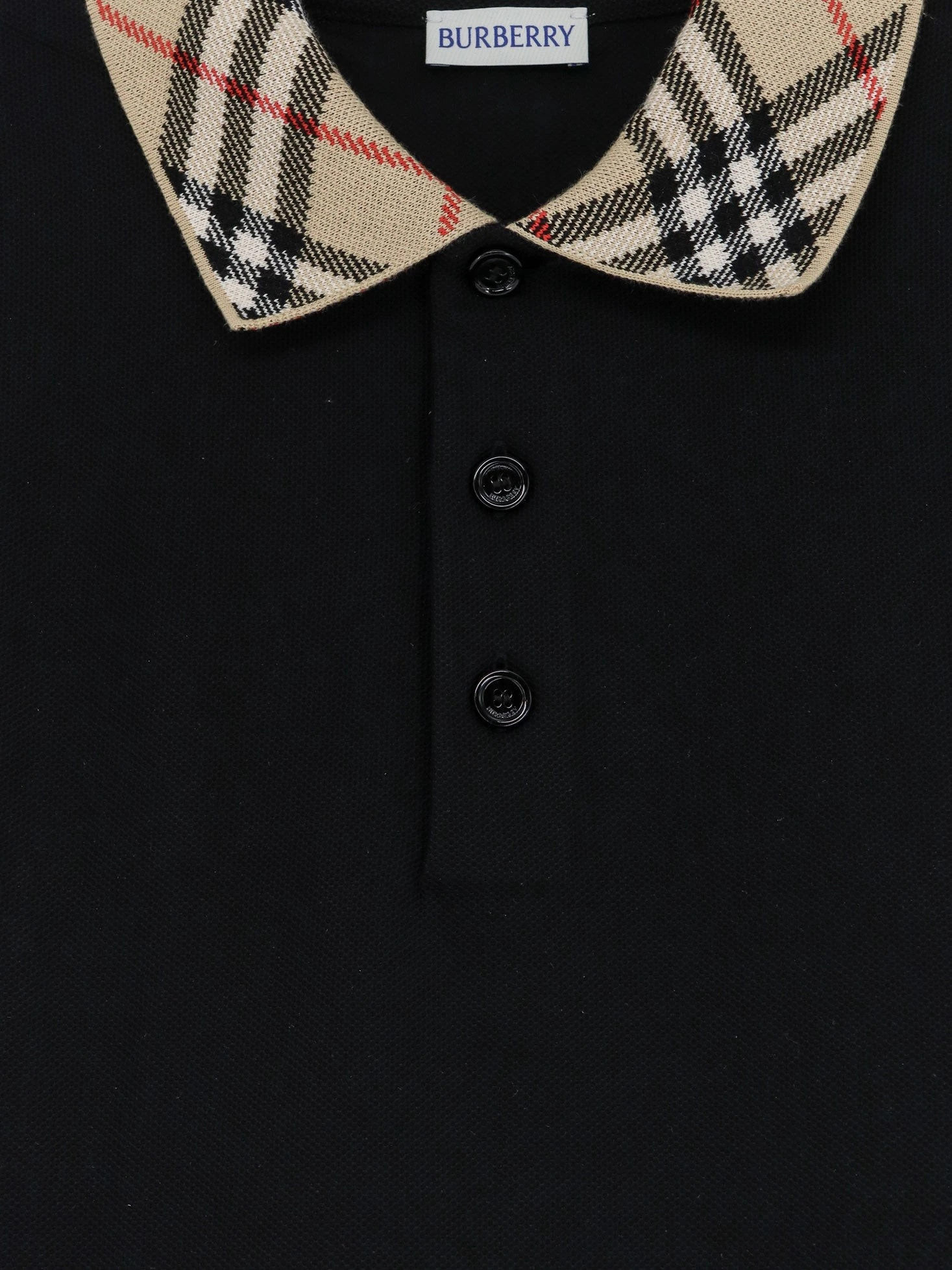 Cotton polo shirt with check collar detail.webp