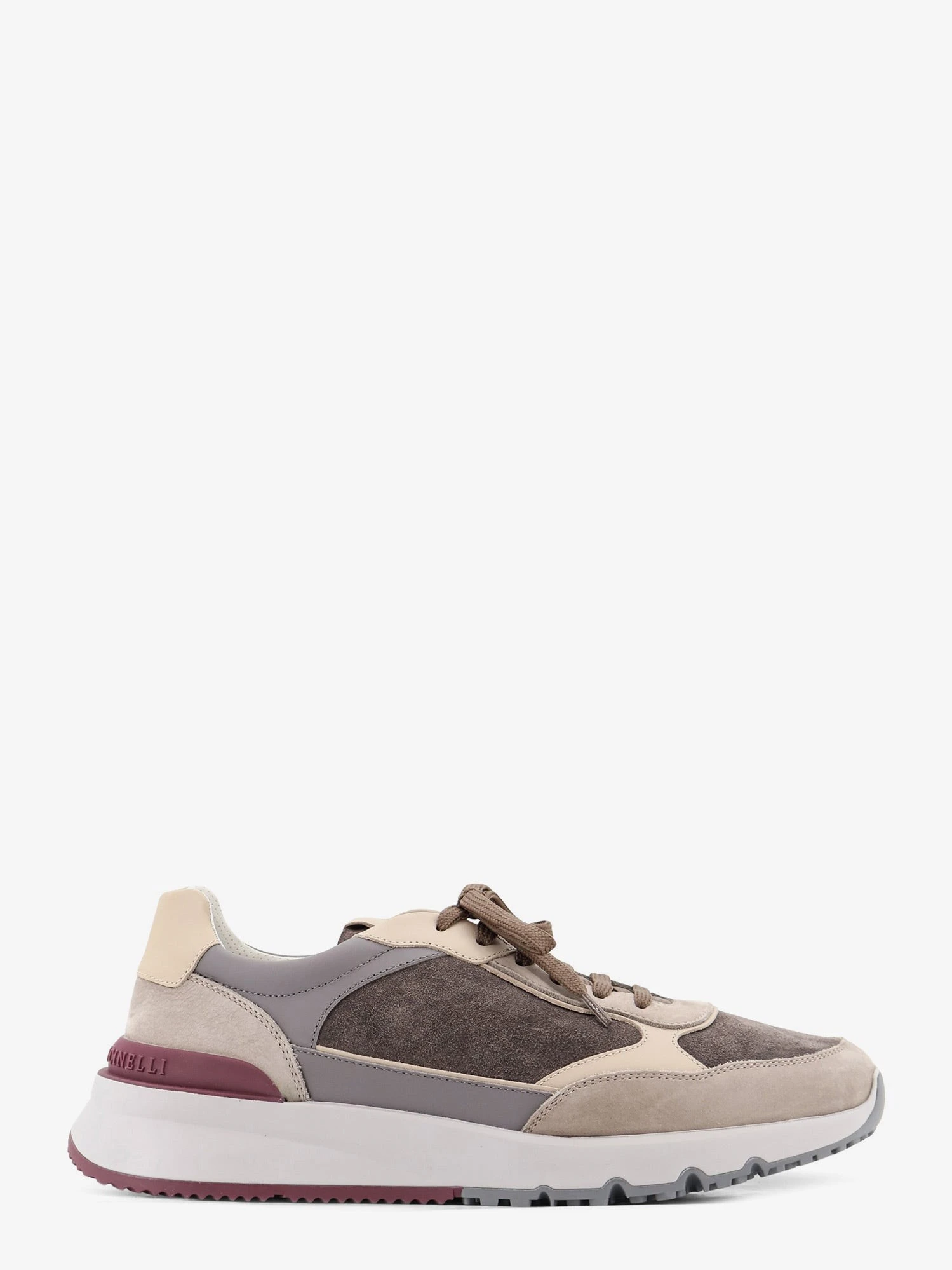 Suede sneakers with leather inserts.webp