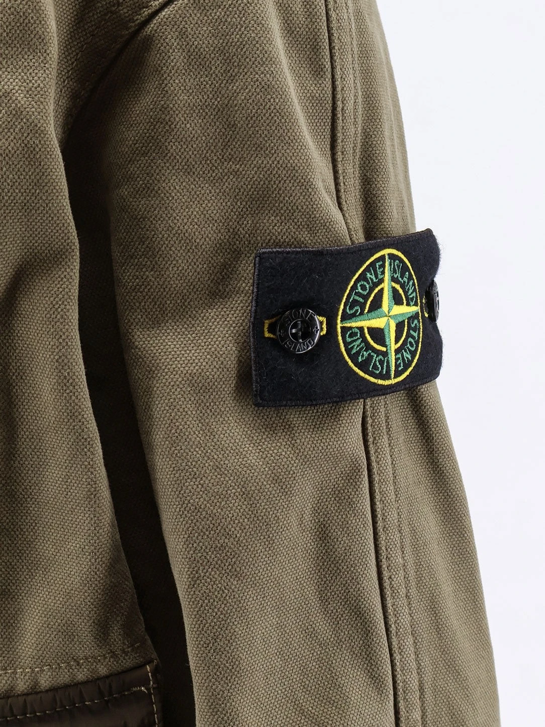 Organic cotton jacket with nylon hood.webp