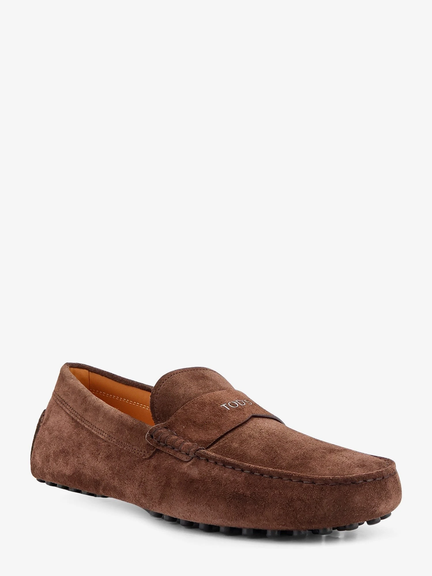 Suede loafers with Gommini detail on the back.webp