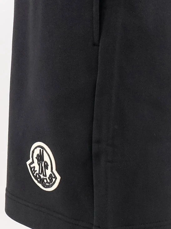 Cotton bermuda shorts with front logo patch.webp