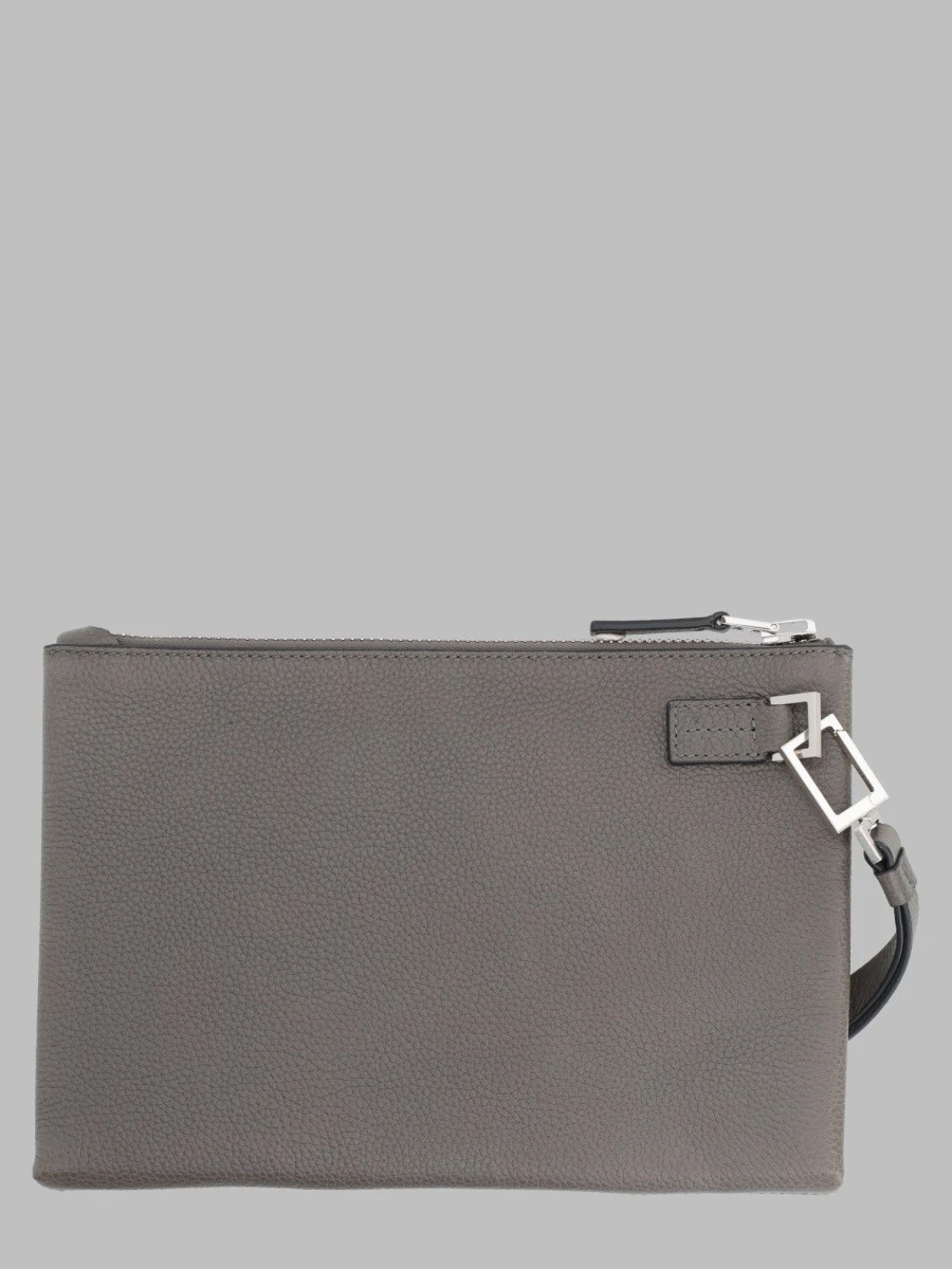 POUCHETTE MINIMAL SOTTILE IN PELLE FIORE CON CINTURINO DA POLSO.webp