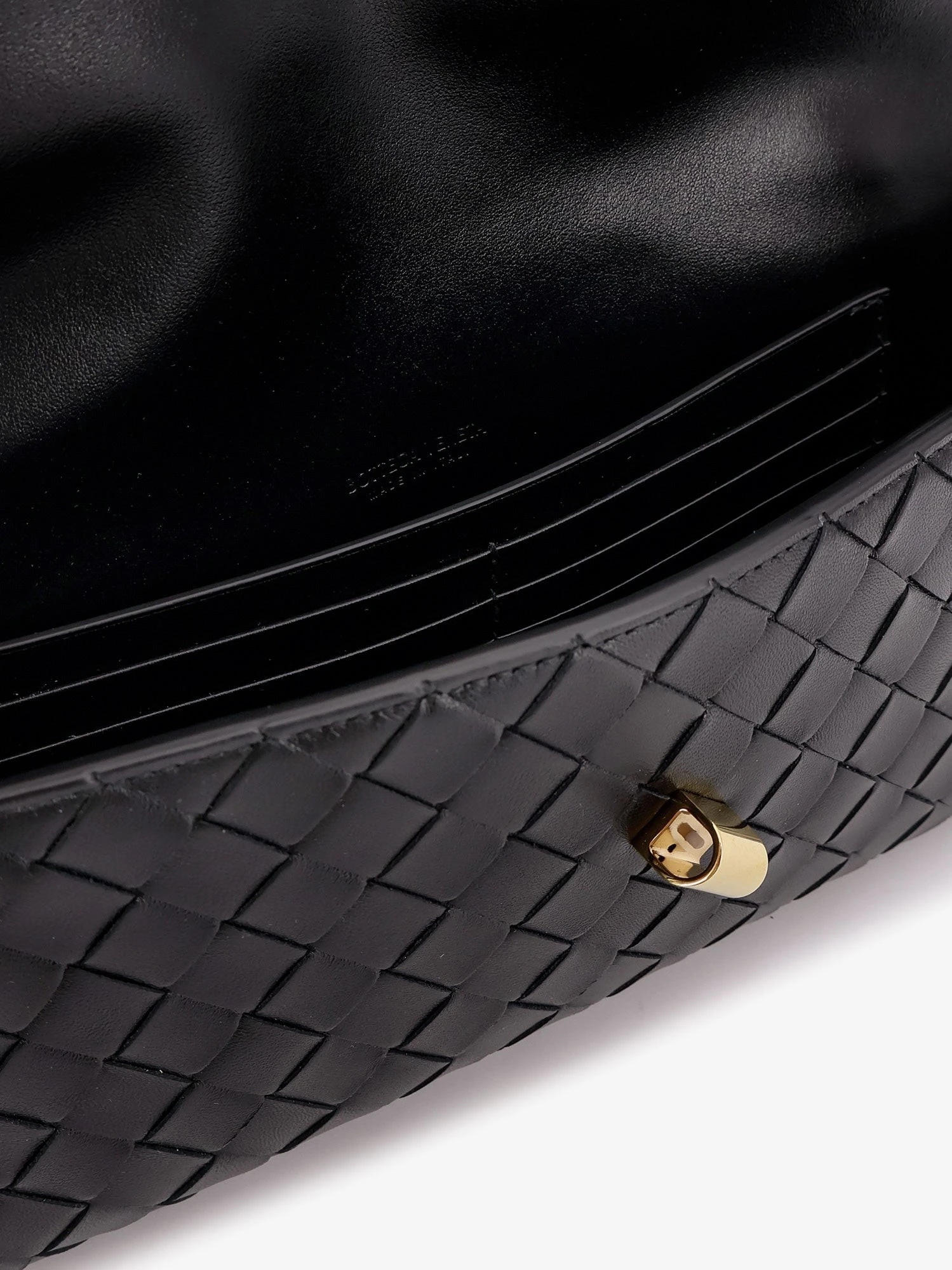 Andiamo Leather Clutch with Intrecciato Pattern.webp