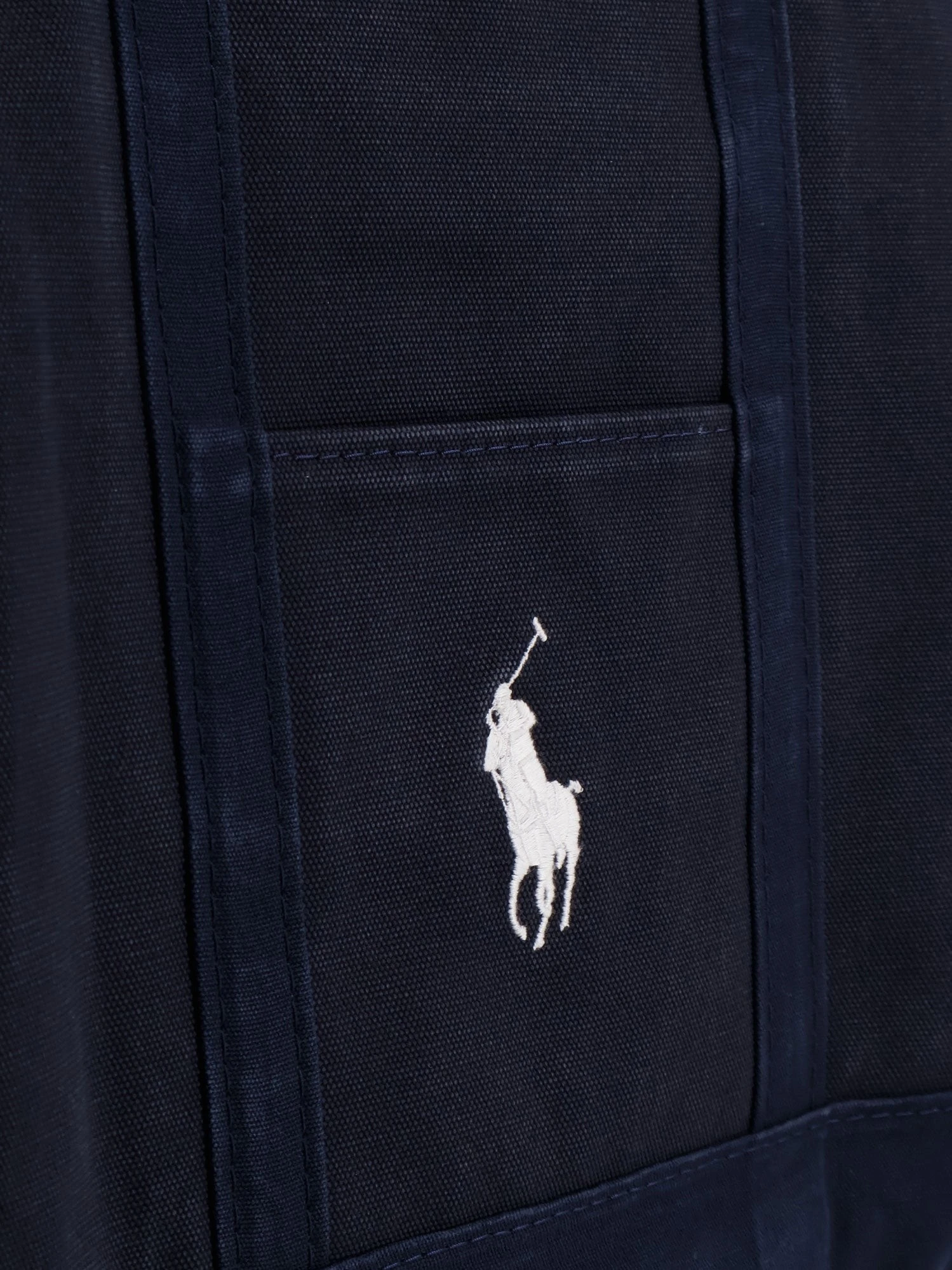 Denim shoulder bag with embroidered logo on the front