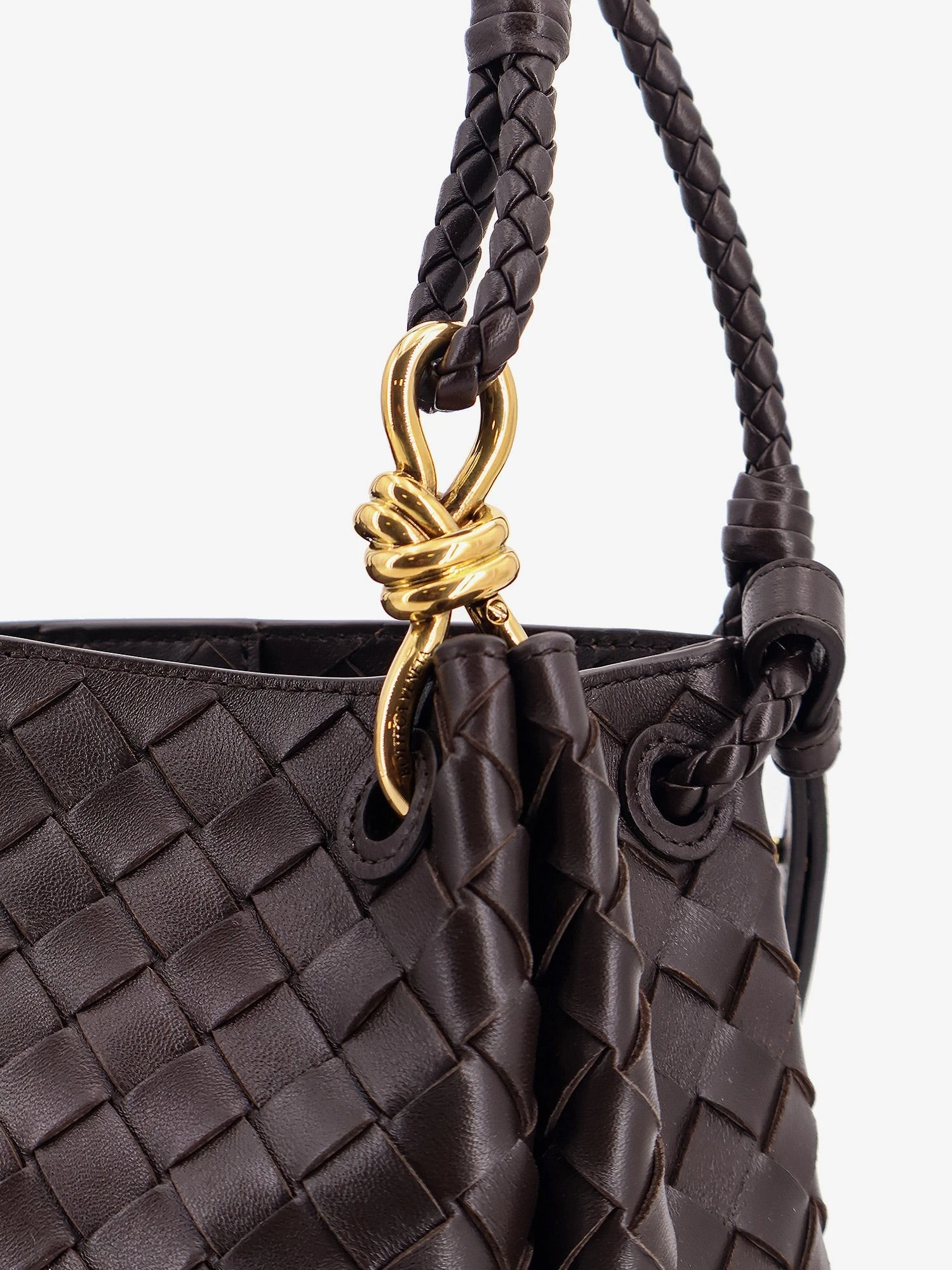 Parachute leather shoulder bag with Intrecciato pattern and Knot detail.webp