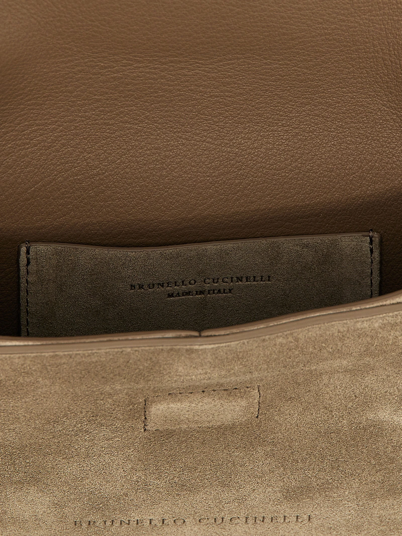 Monile suede clutch bag