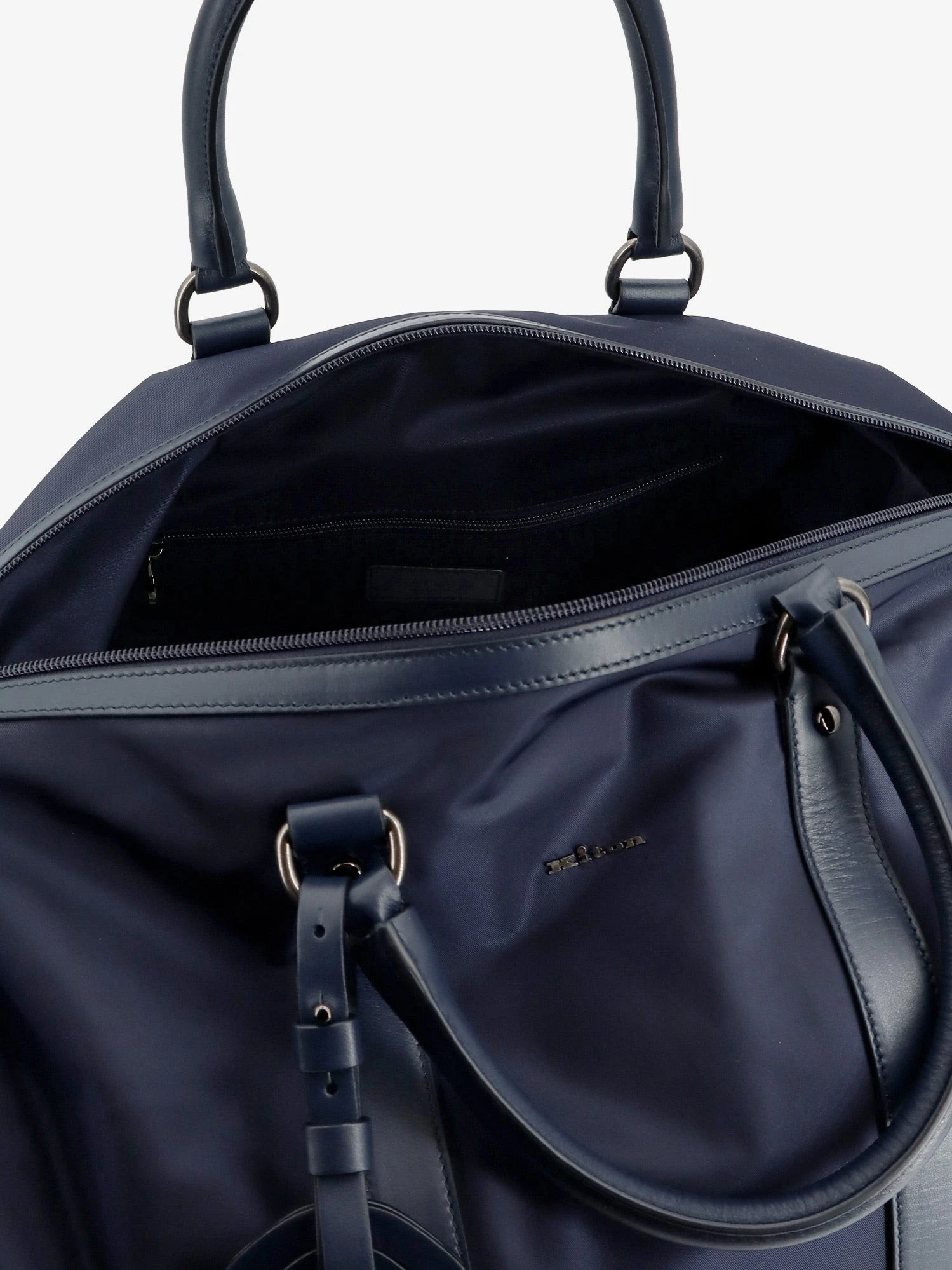Nylon travel bag with leather inserts