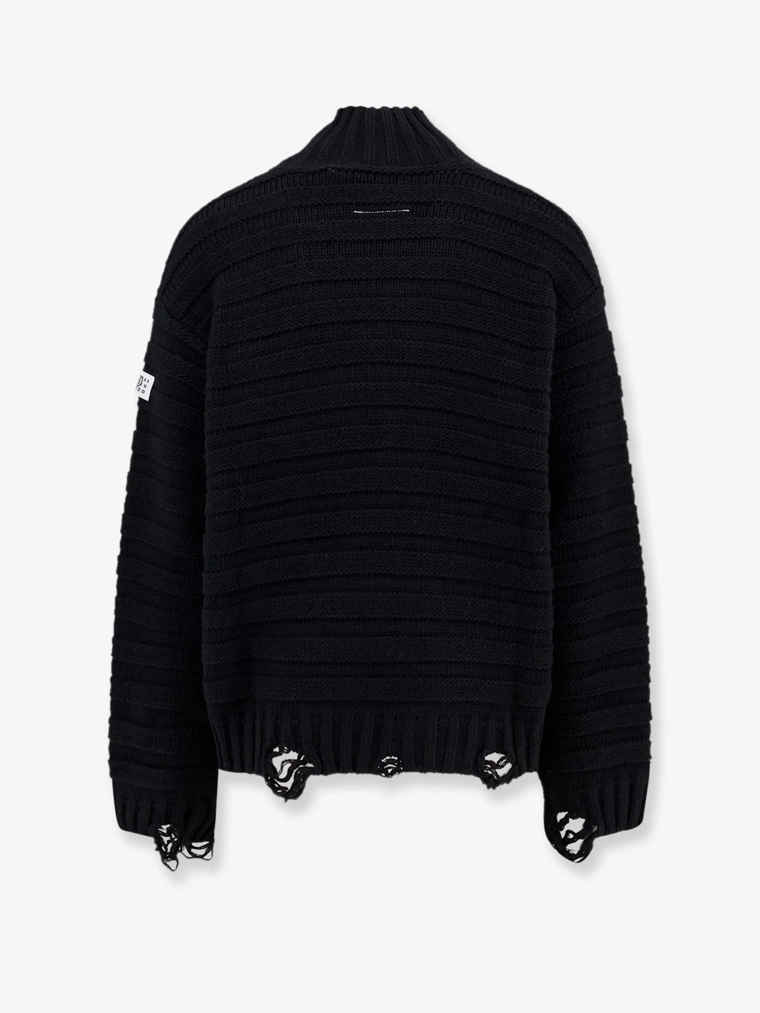 Wool blend sweater with distressed effect