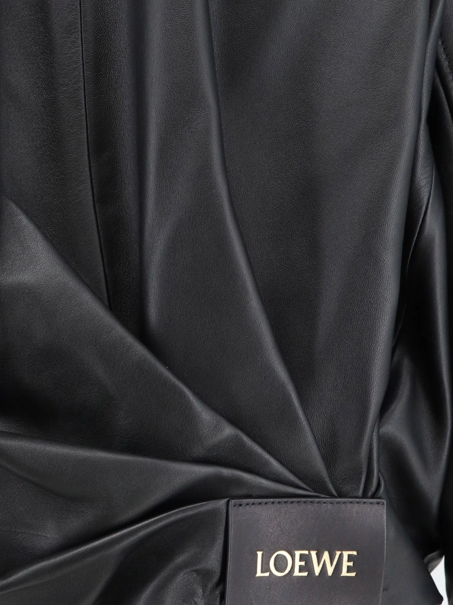 Cropped leather jacket with back logo patch