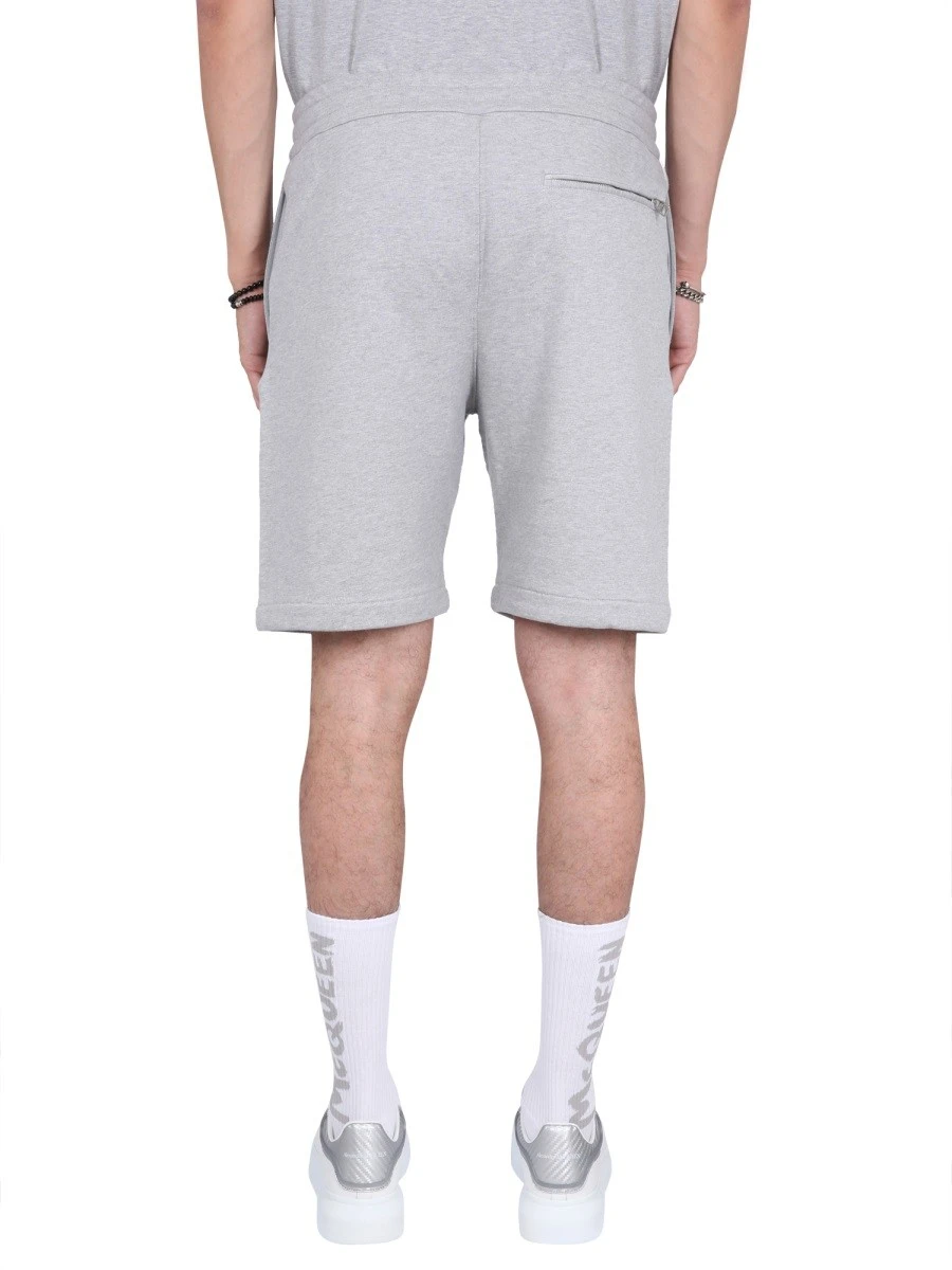 BERMUDA SHORTS WITH GRAFFITI LOGO PRINT.webp