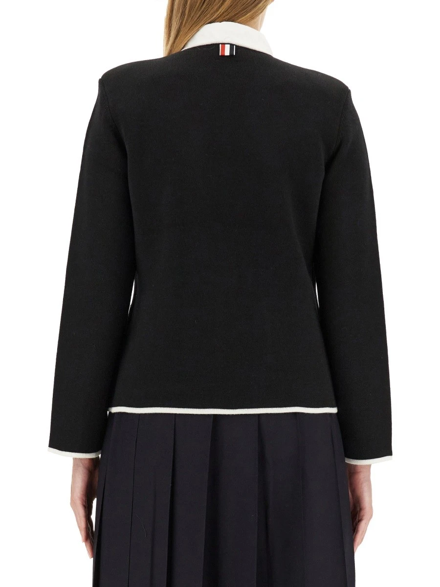 SINGLE-BREASTED COLLARLESS JACKET.webp