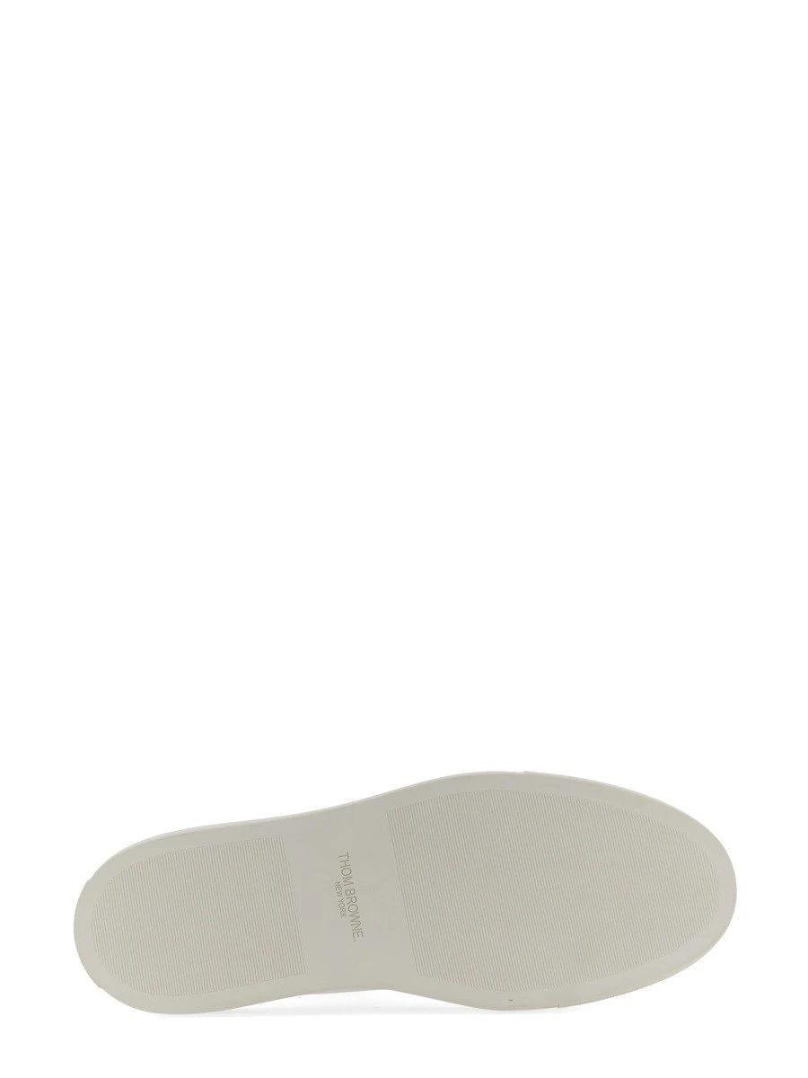 LOW-TOP LEATHER SNEAKER.webp