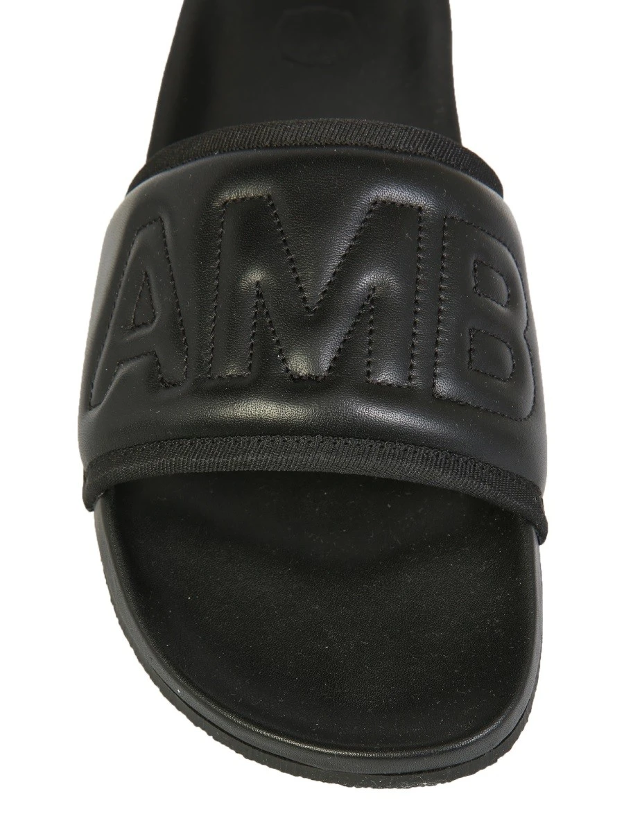 LEATHER SLIDE SANDALS.webp