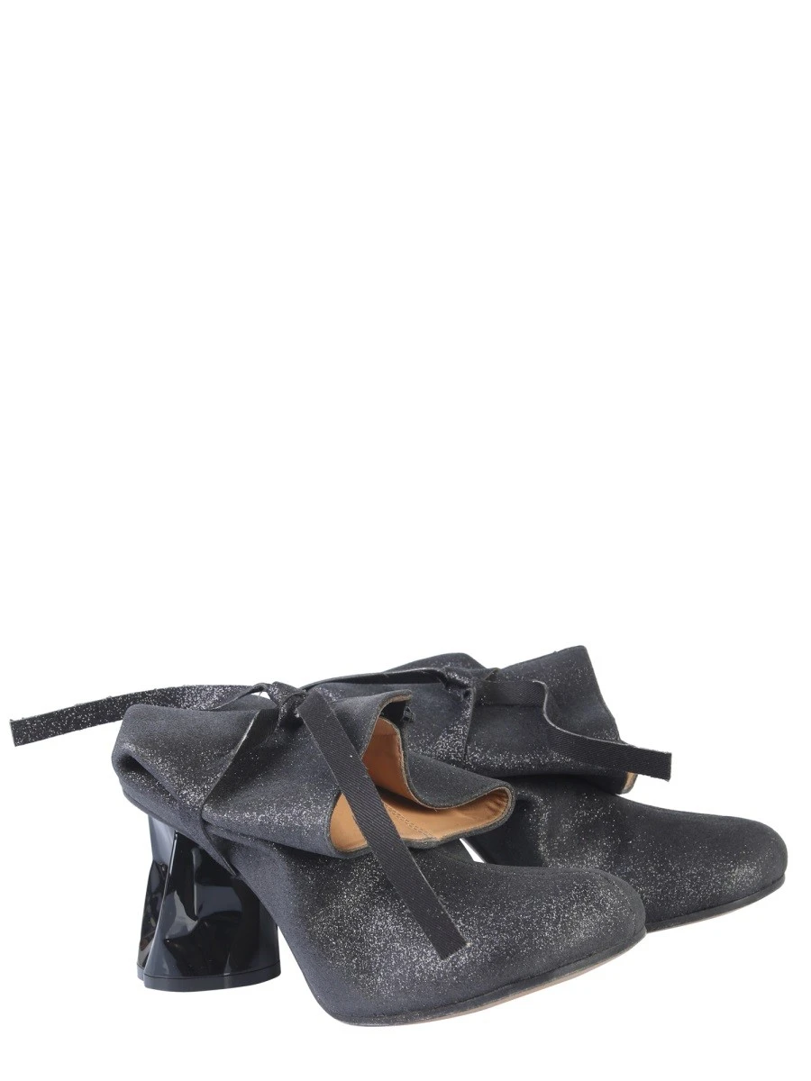 BOOT WITH CRUSHED HEEL.webp