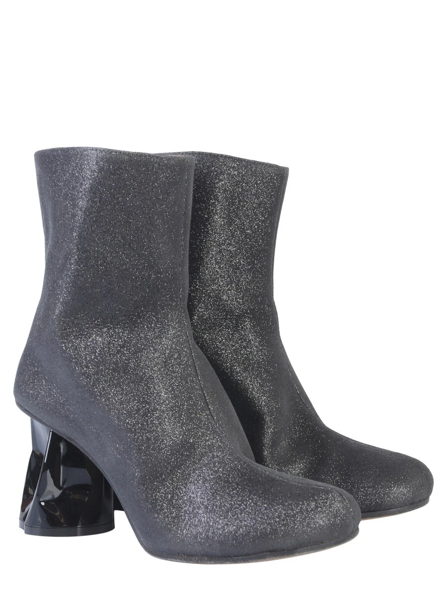 BOOT WITH CRUSHED HEEL.webp