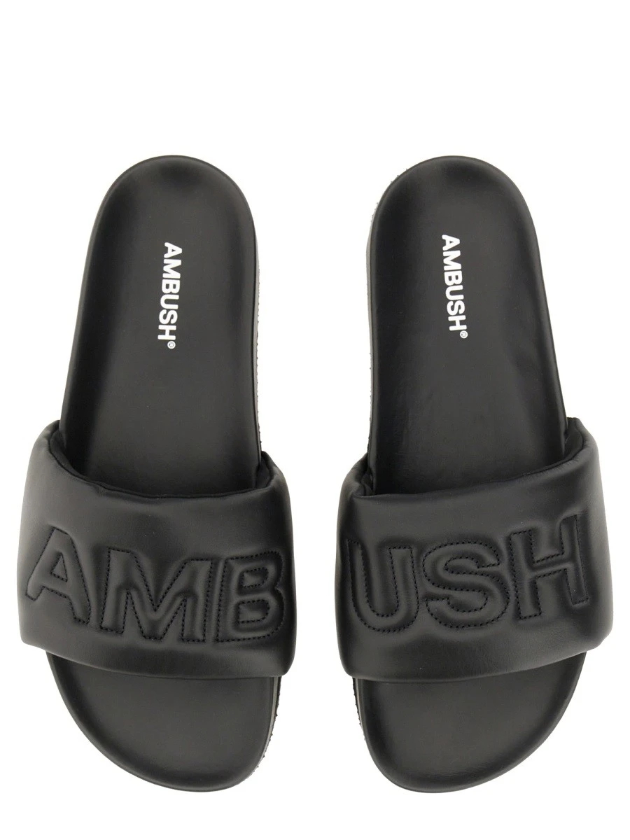LEATHER SLIDE SANDAL.webp