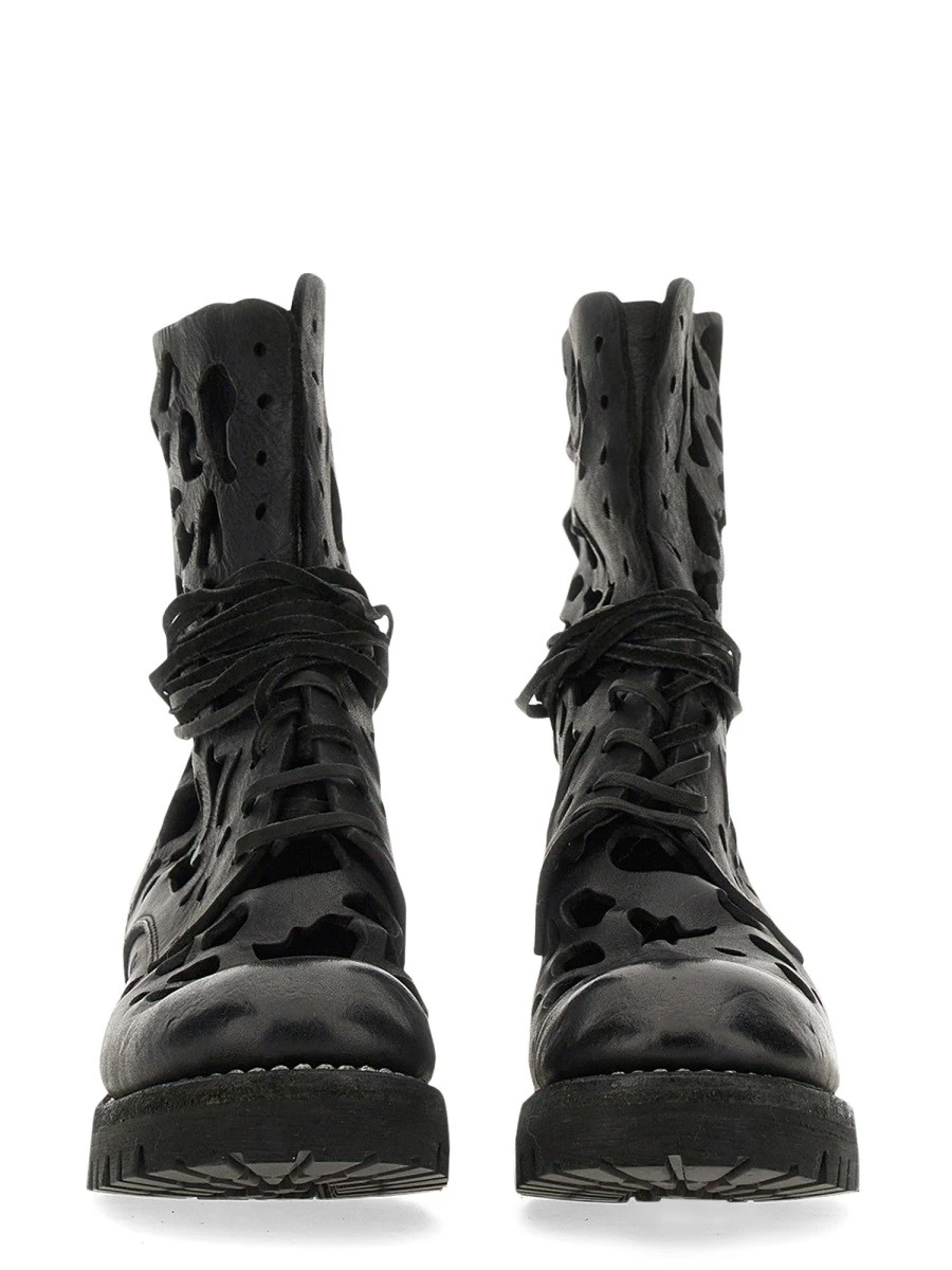 ANKLE BOOT WITH CUT OUT DETAILS.webp
