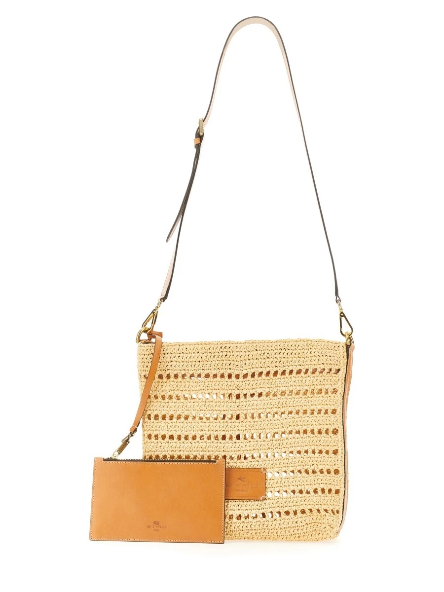 PERFORATED RAFFIA SHOULDER BAG.webp