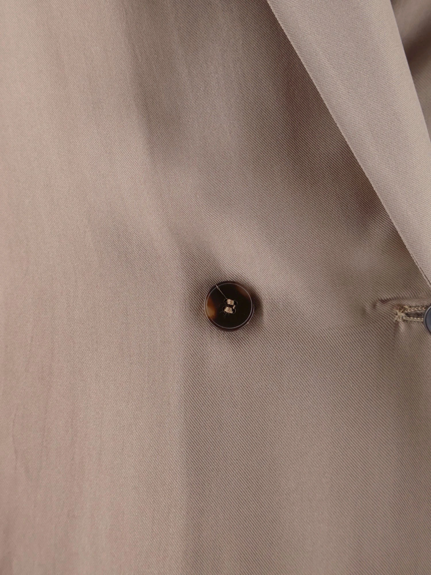 Double-breasted silk blazer.webp