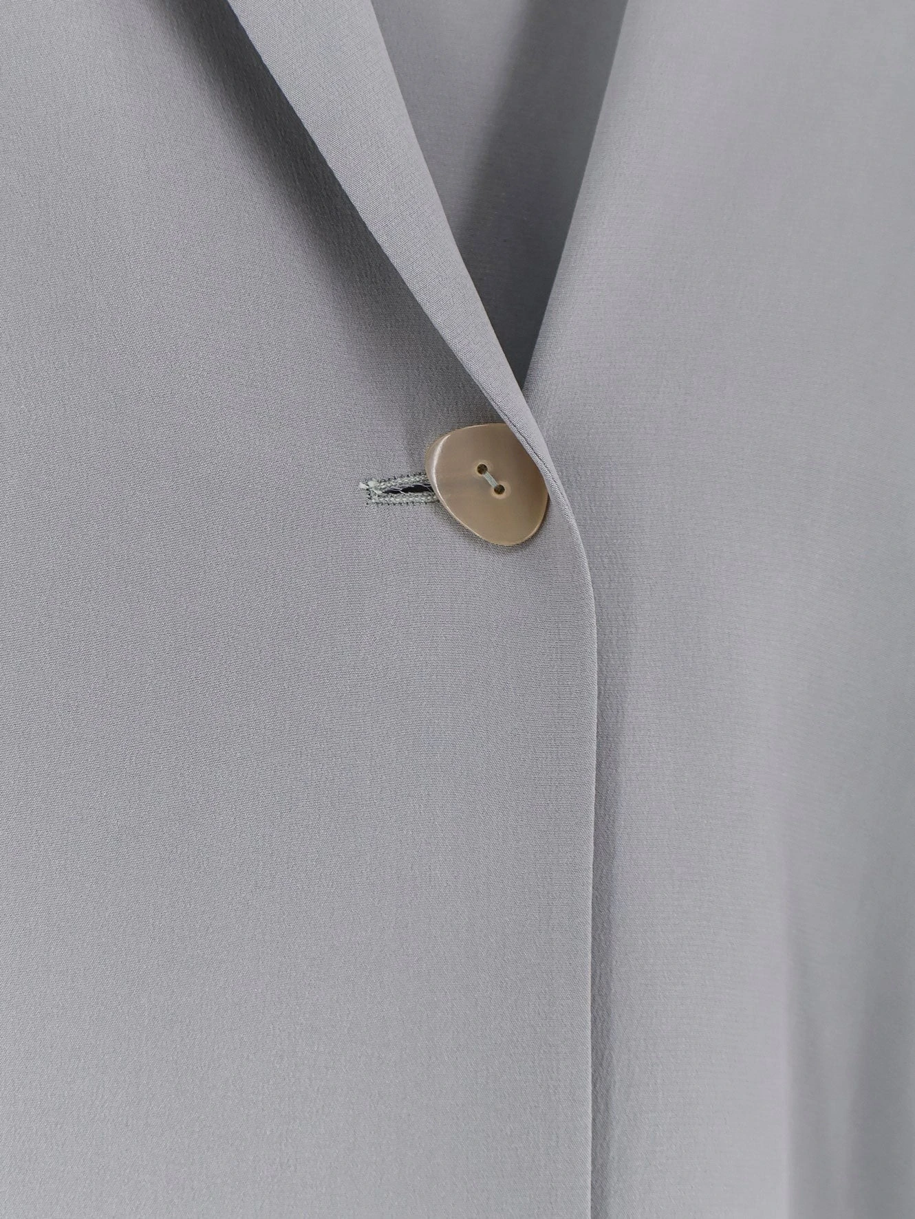 Loose silk blazer.webp