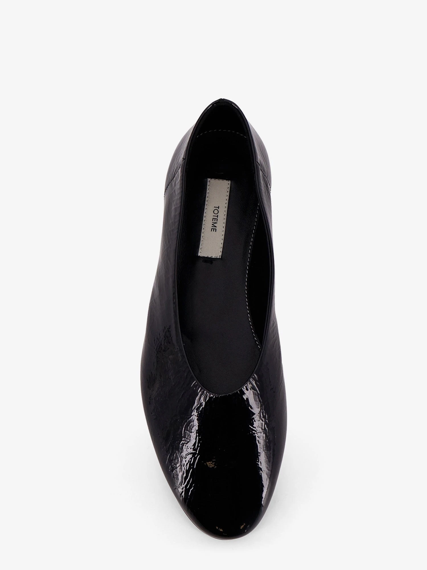 Patent leather ballerinas.webp
