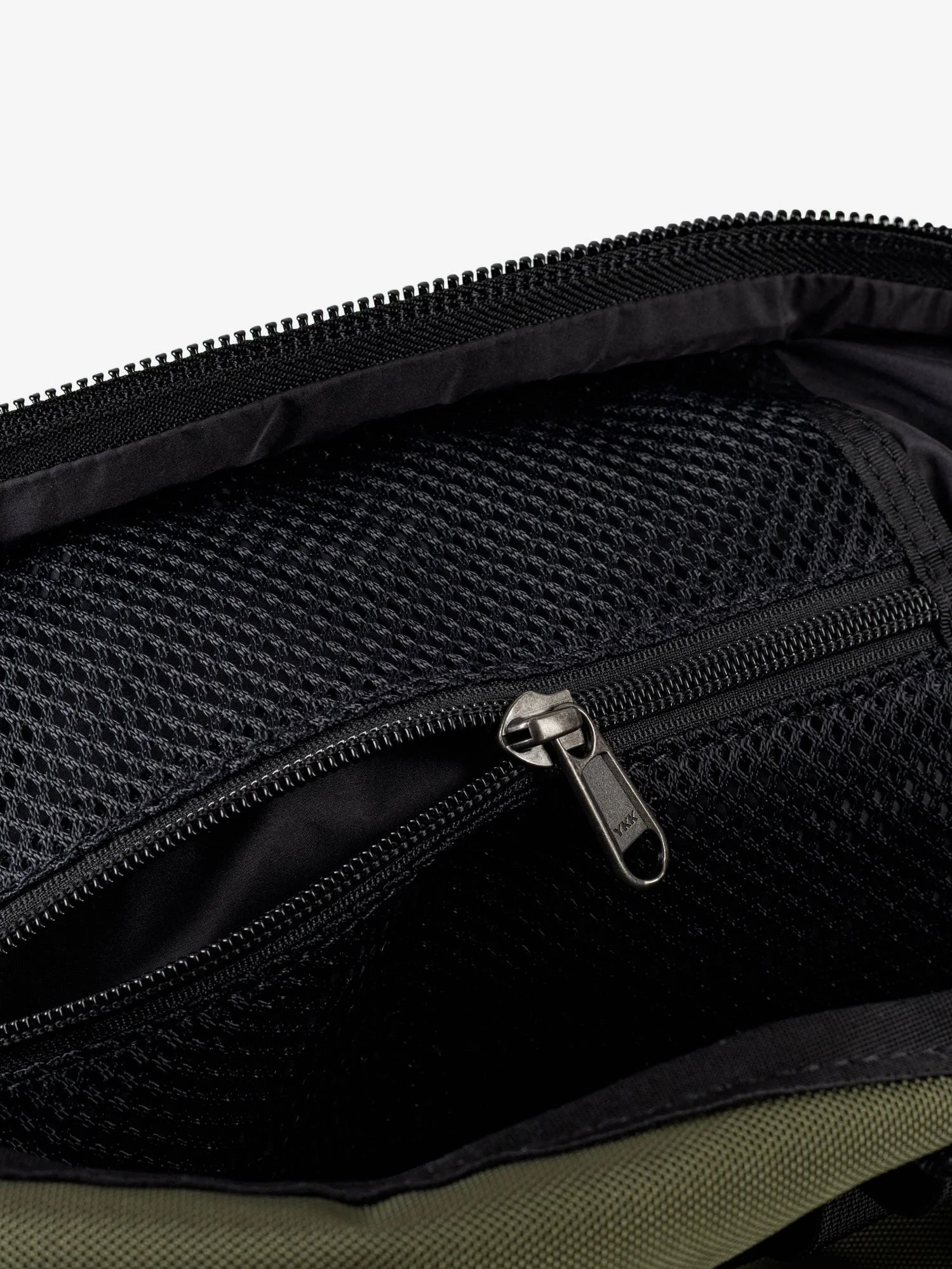 Nylon shoulder bag with logo label on the bottom.webp