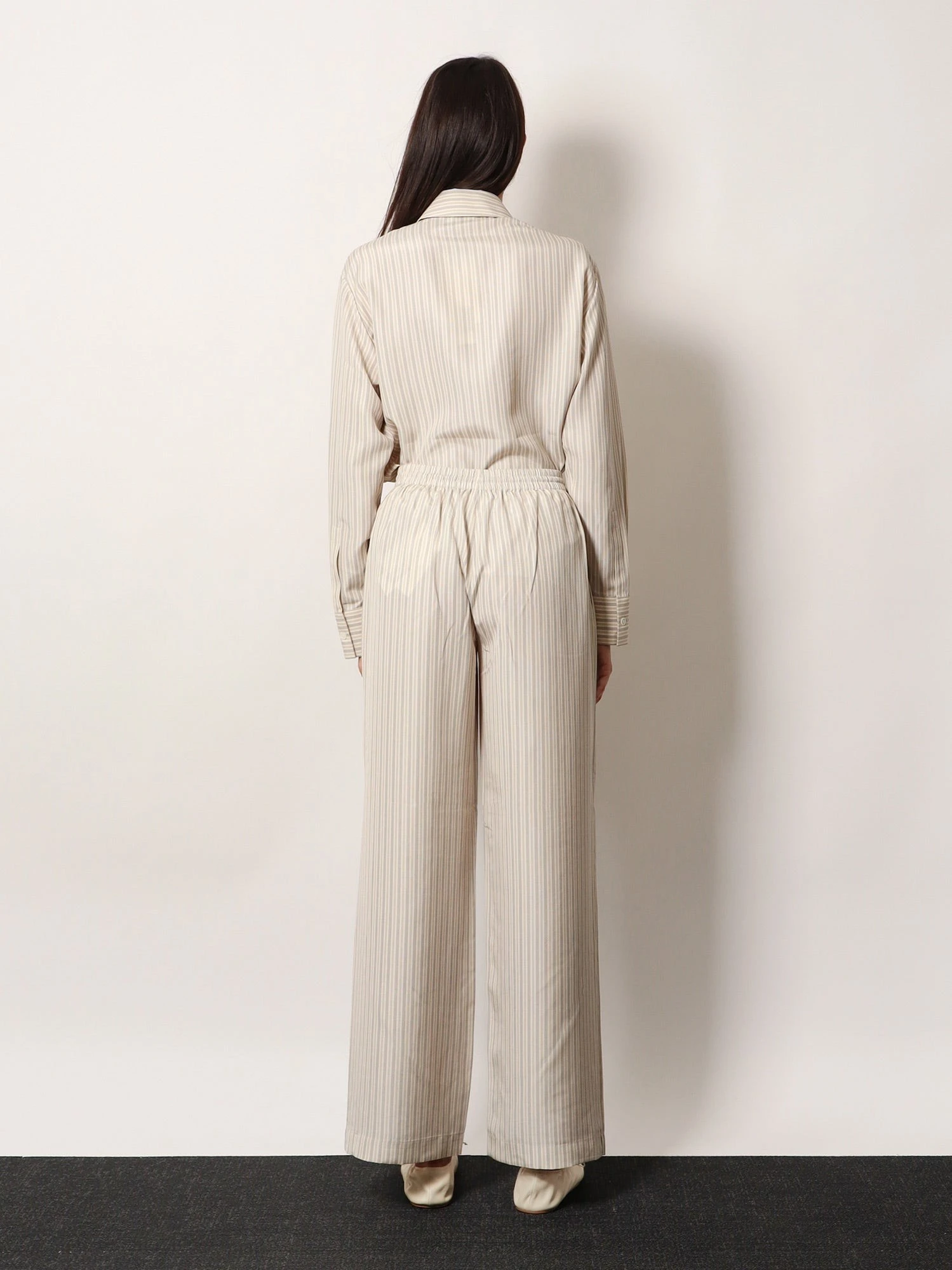 Silk striped trousers.webp