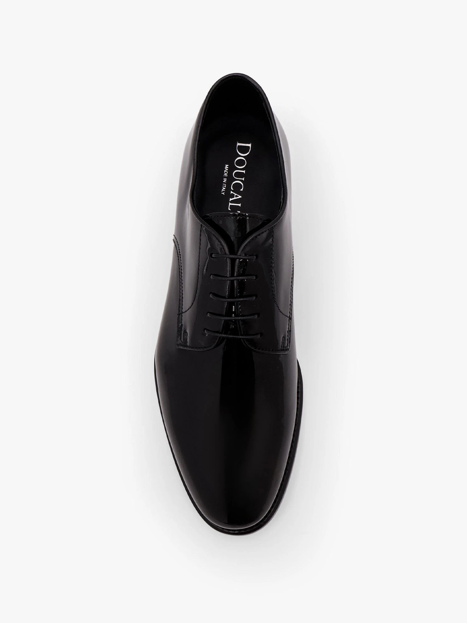Lace-up patent leather shoe.webp