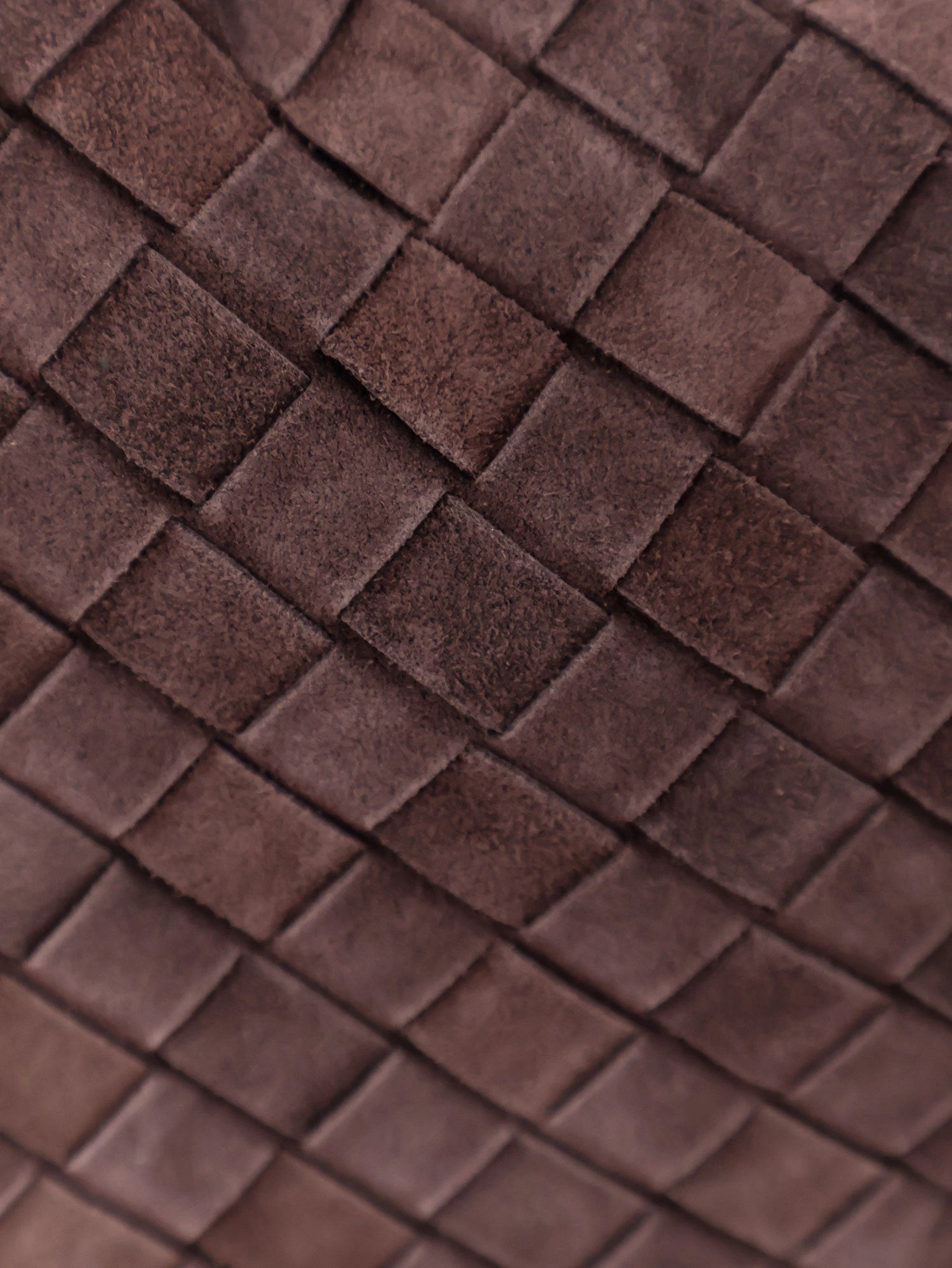 Hop leather shoulder bag with Intrecciato effect.webp
