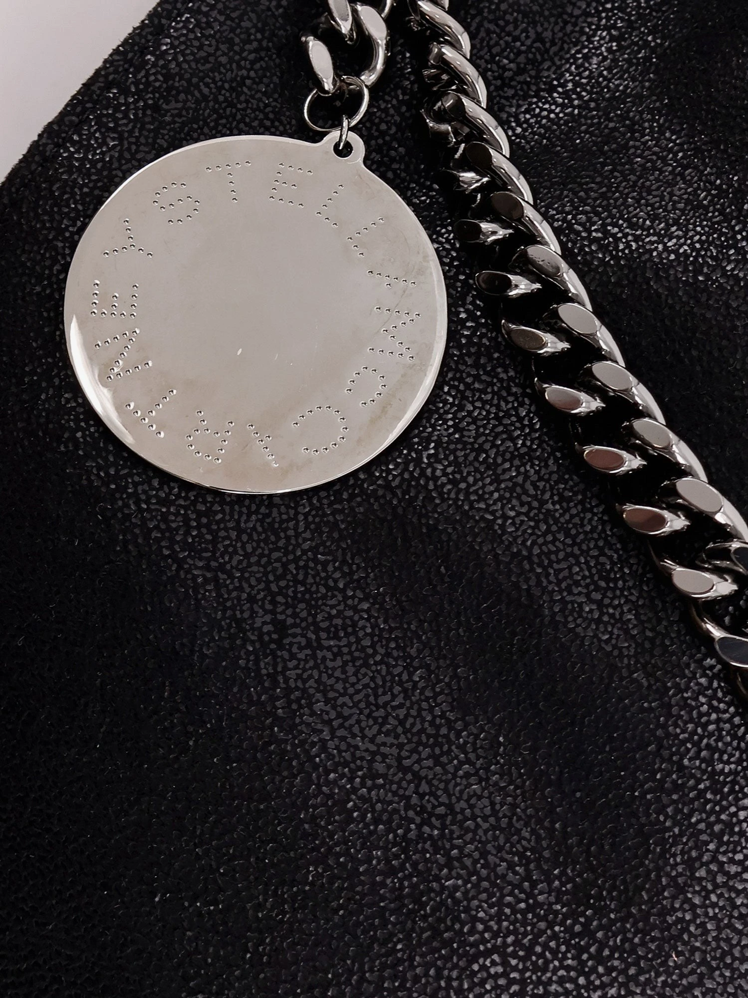 Falabella shoulder bag with metal drawstring.webp